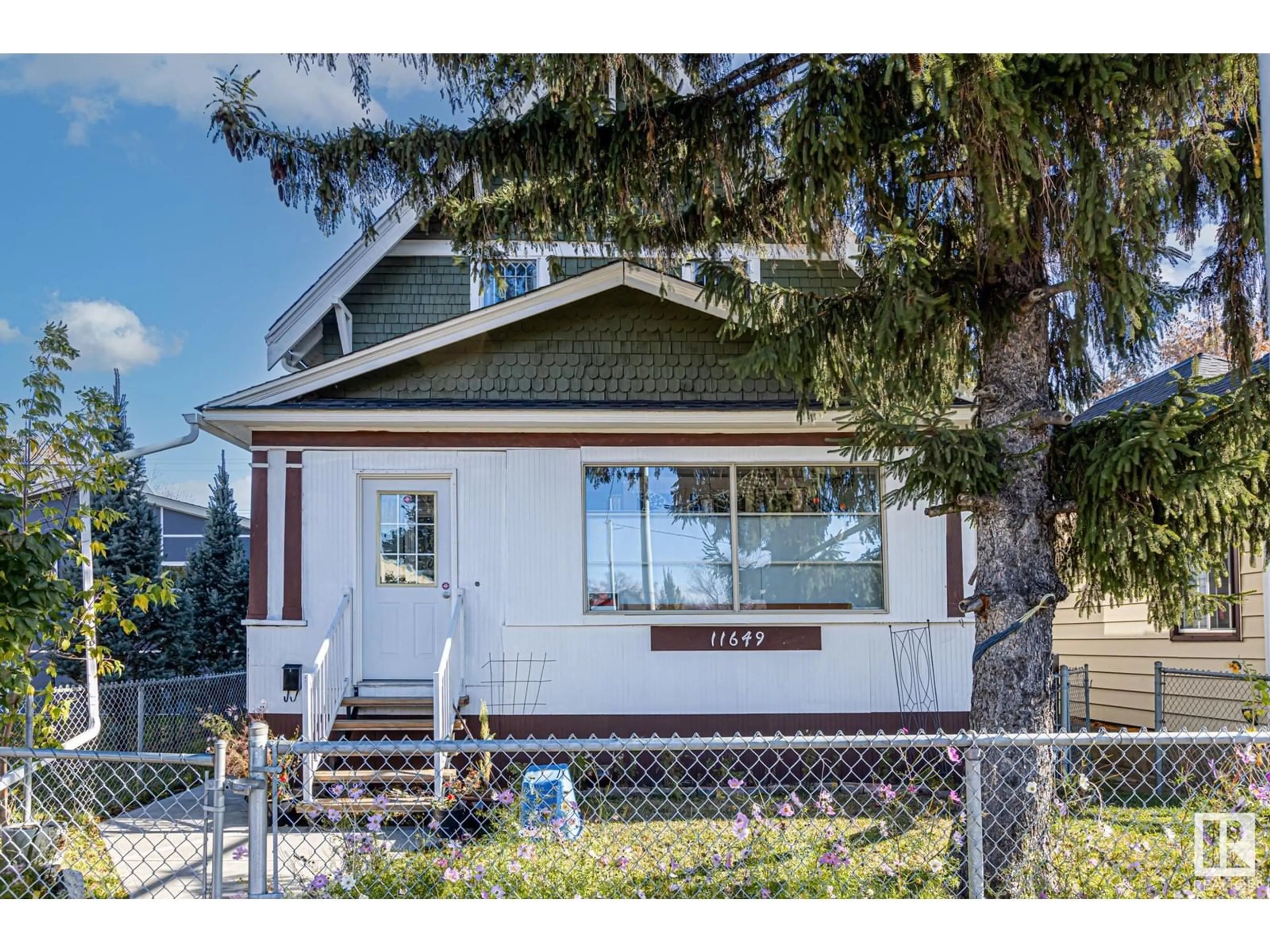 Frontside or backside of a home, cottage for 11649 95 ST NW, Edmonton Alberta T5G1L7