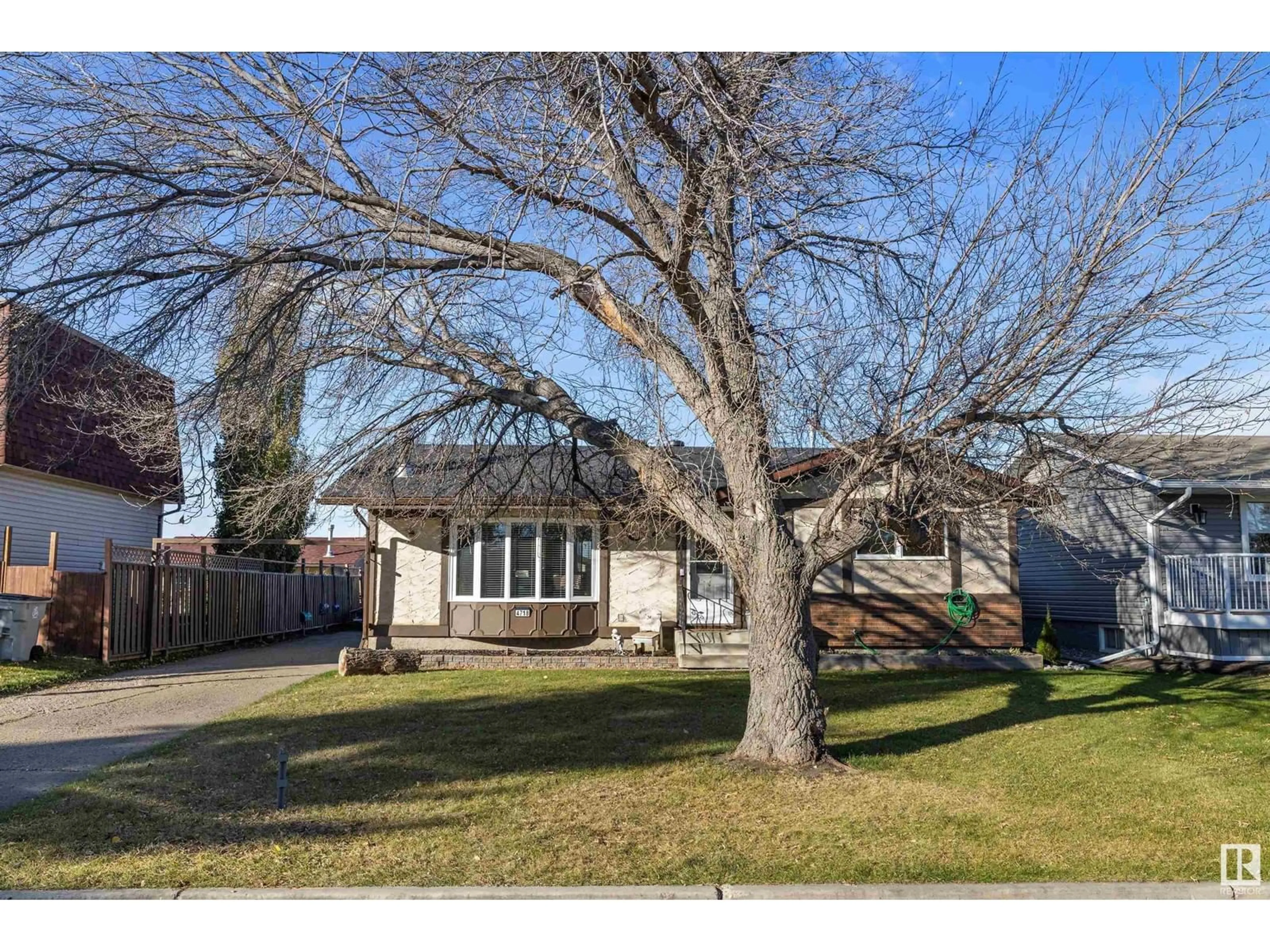 Frontside or backside of a home, the fenced backyard for 4718 51 ST, Legal Alberta T0G0L0