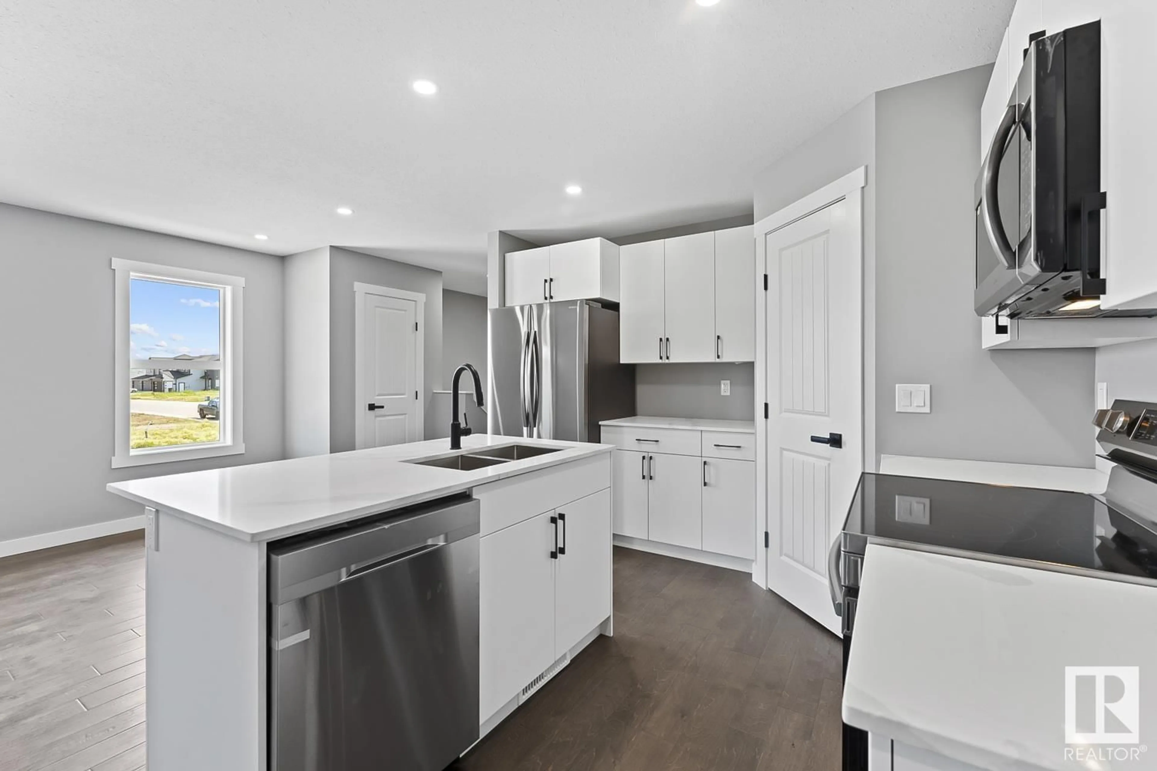 Open concept kitchen, ceramic/tile floor for 6825 B TRI CITY WY, Cold Lake Alberta T9M0L3