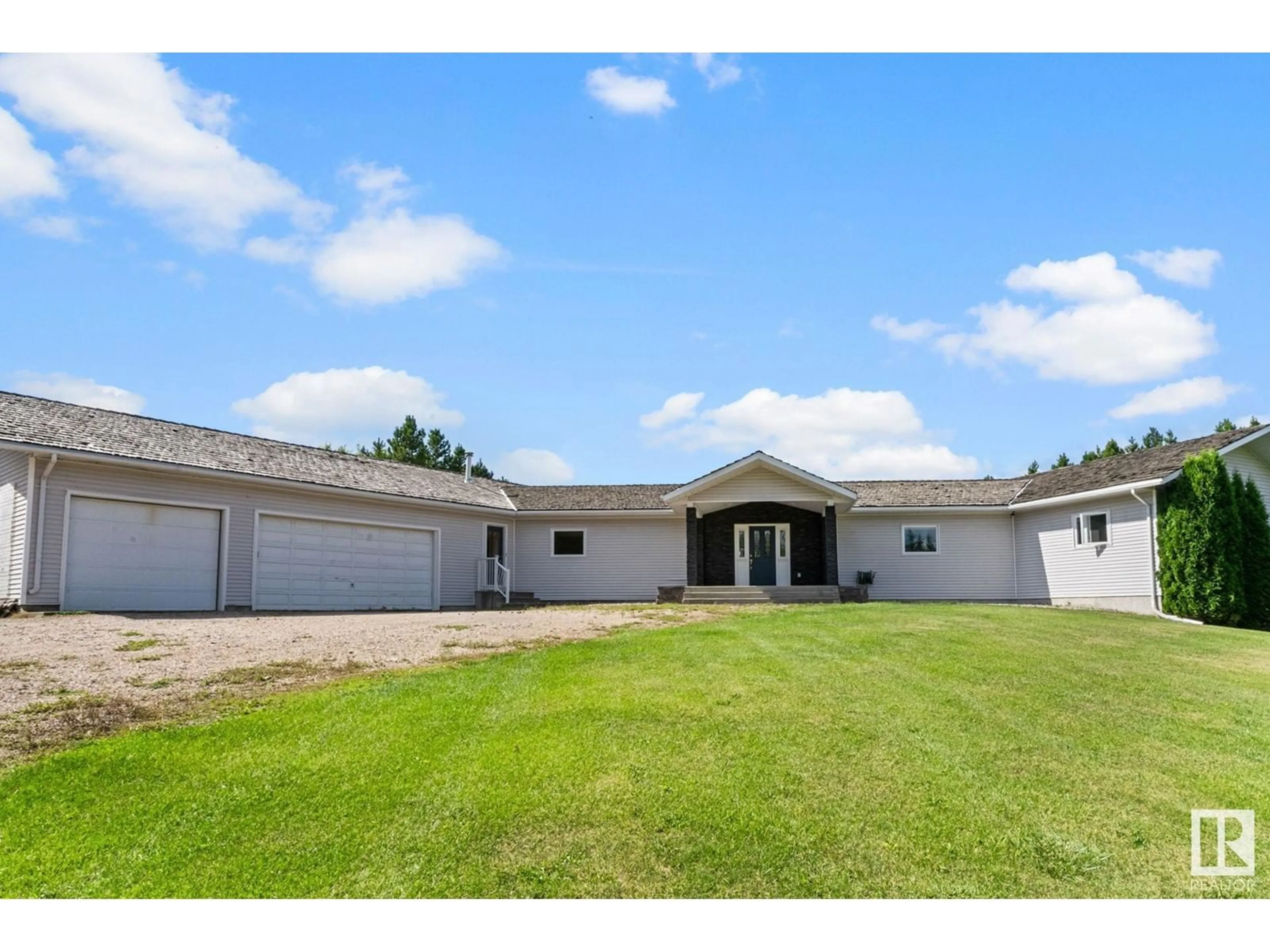 Frontside or backside of a home, the front or back of building for 277 52514 RGE ROAD 223, Rural Strathcona County Alberta T8A4R5