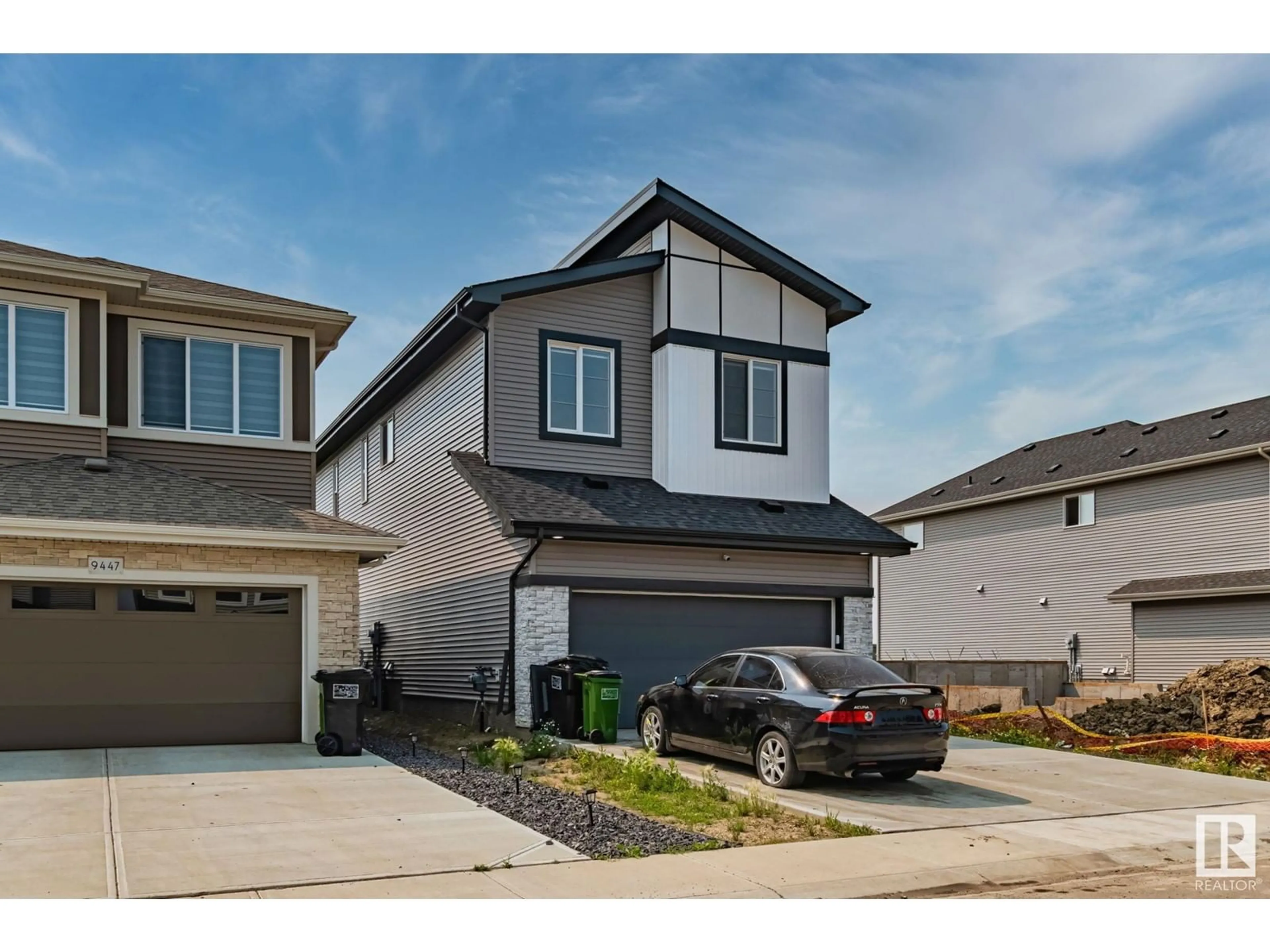 Home with vinyl exterior material, street for 9449 Pear CR SW, Edmonton Alberta T6X2Z5