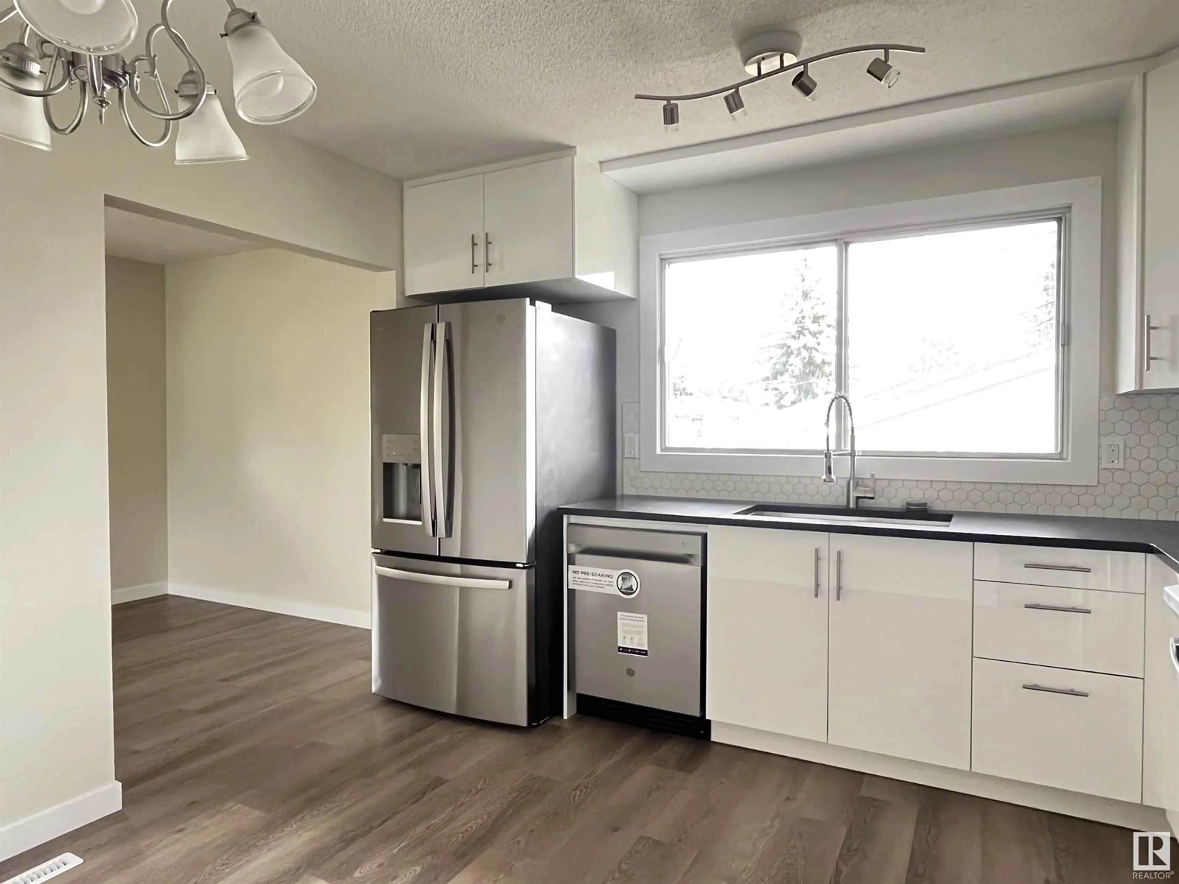 Open concept kitchen for 9303 168 ST NW, Edmonton Alberta T5R2W1