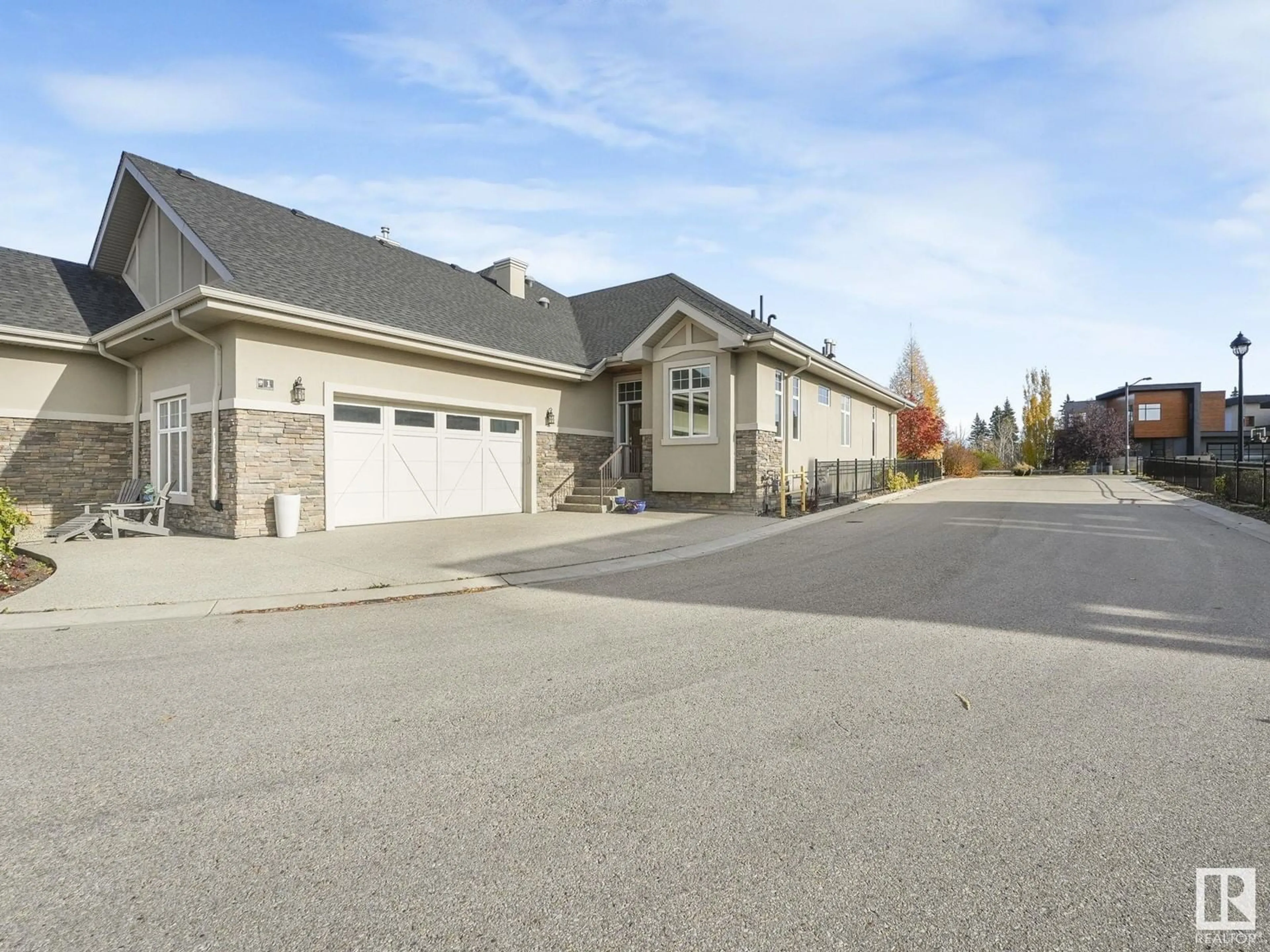 Frontside or backside of a home, the street view for #1 7570 MAY CM NW, Edmonton Alberta T6R0G9