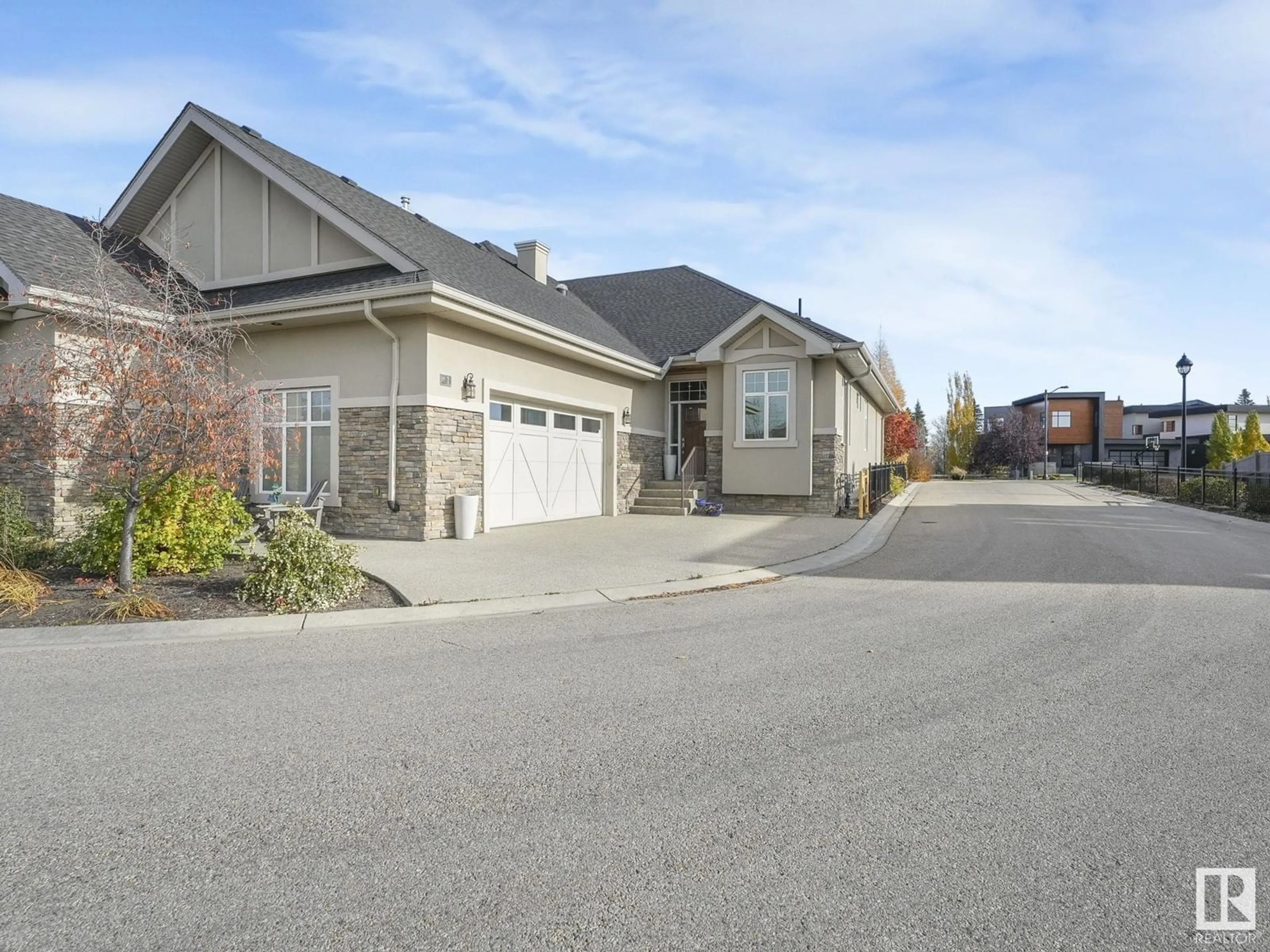 Frontside or backside of a home, the street view for #1 7570 MAY CM NW, Edmonton Alberta T6R0G9