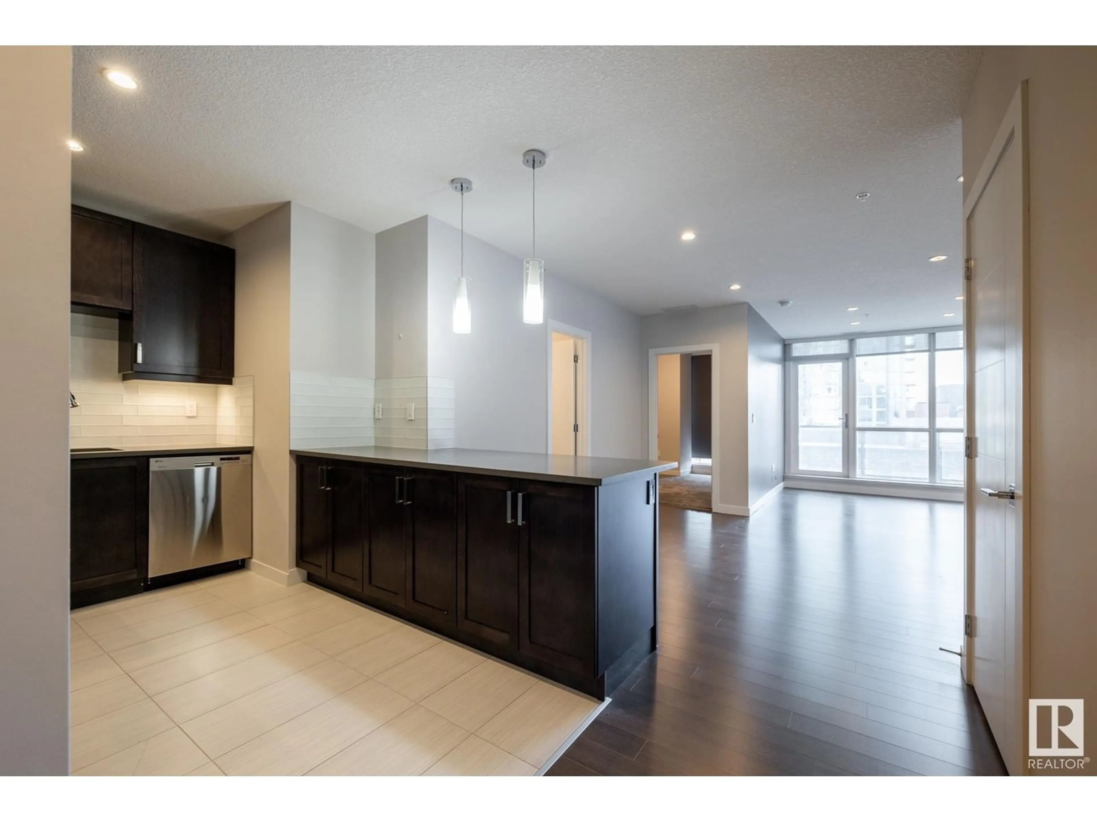 Open concept kitchen for #609 10238 103 ST NW, Edmonton Alberta T5J0G6