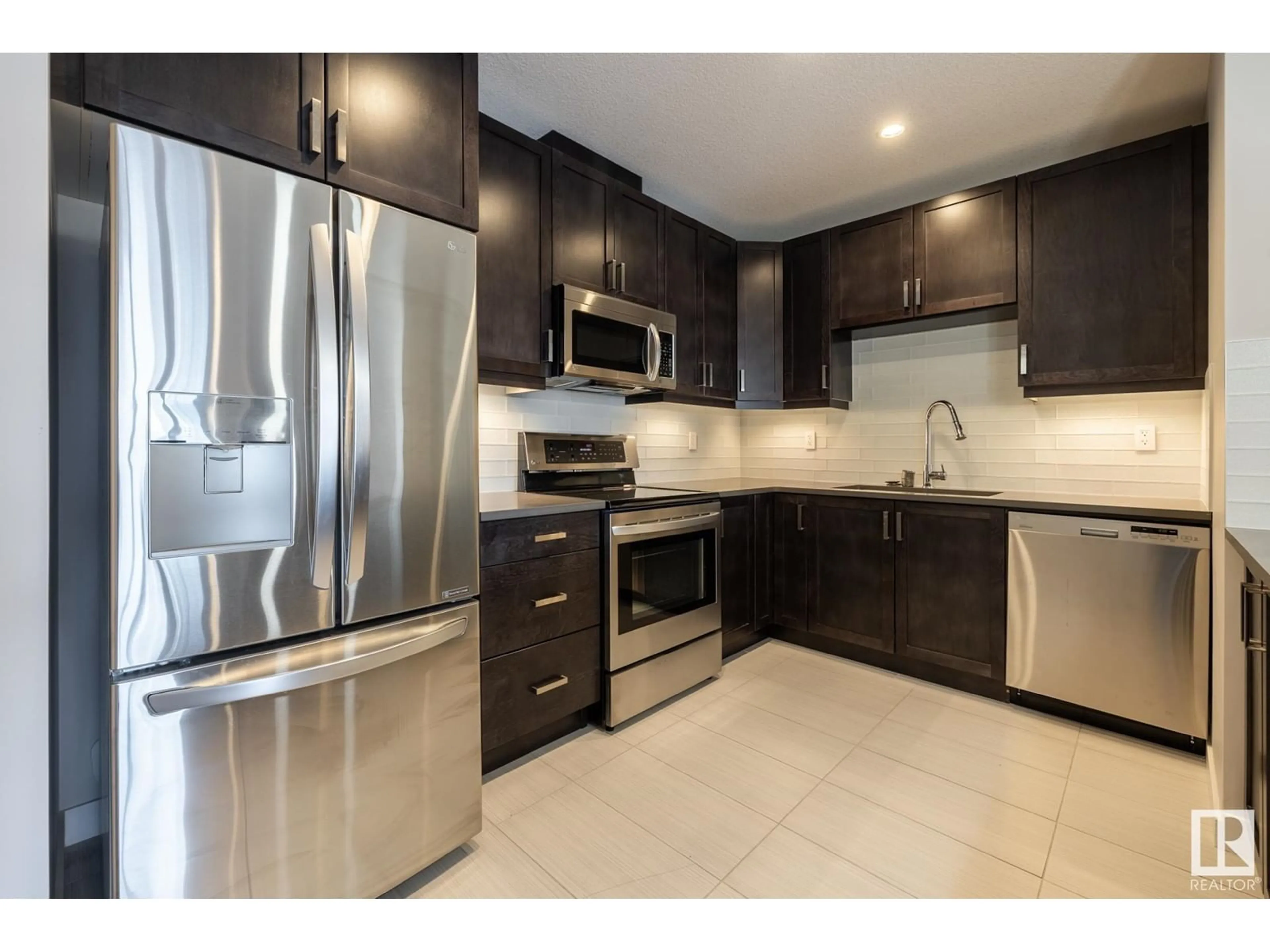 Open concept kitchen for #609 10238 103 ST NW, Edmonton Alberta T5J0G6