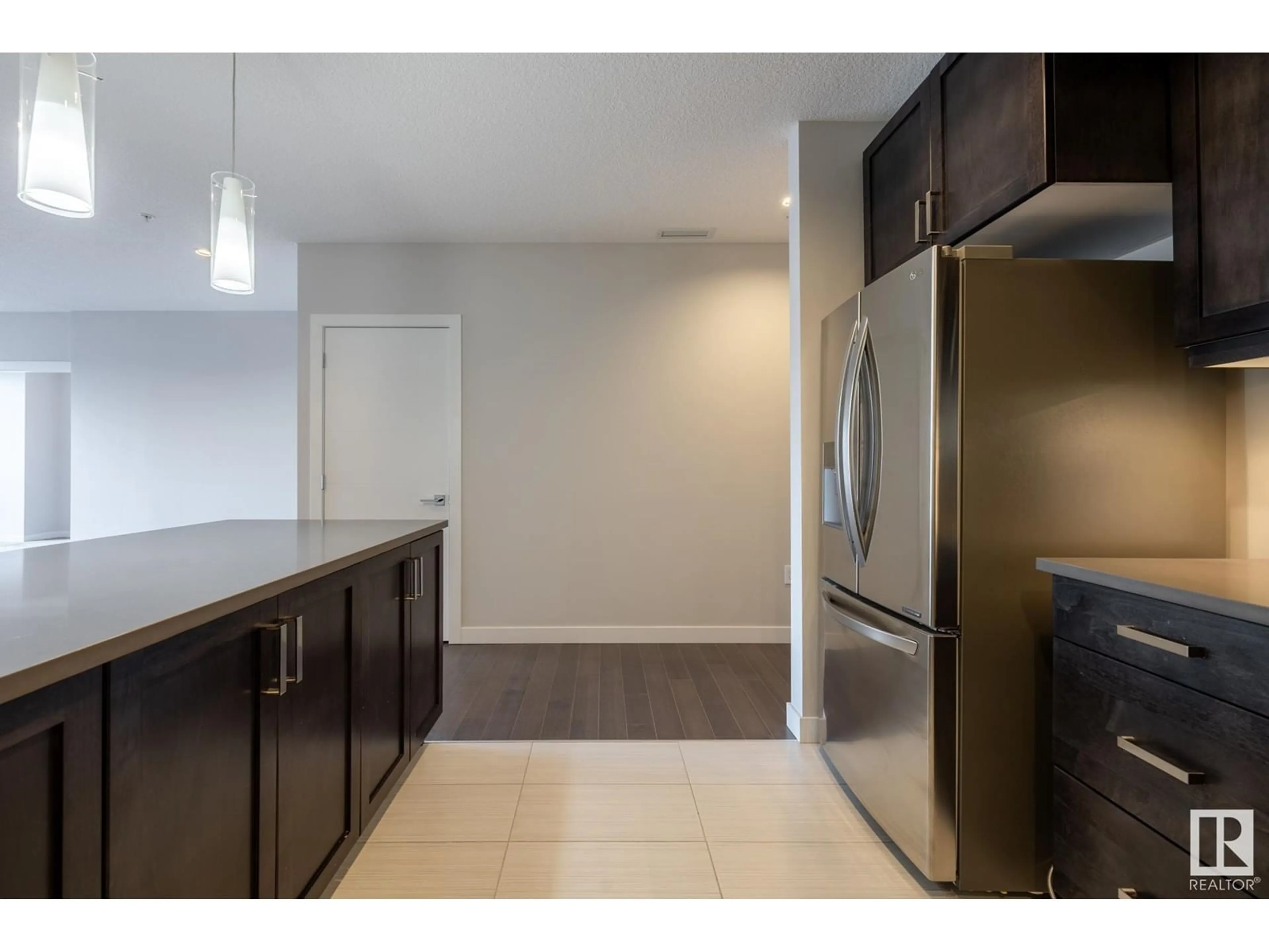 Standard kitchen, wood floors for #609 10238 103 ST NW, Edmonton Alberta T5J0G6