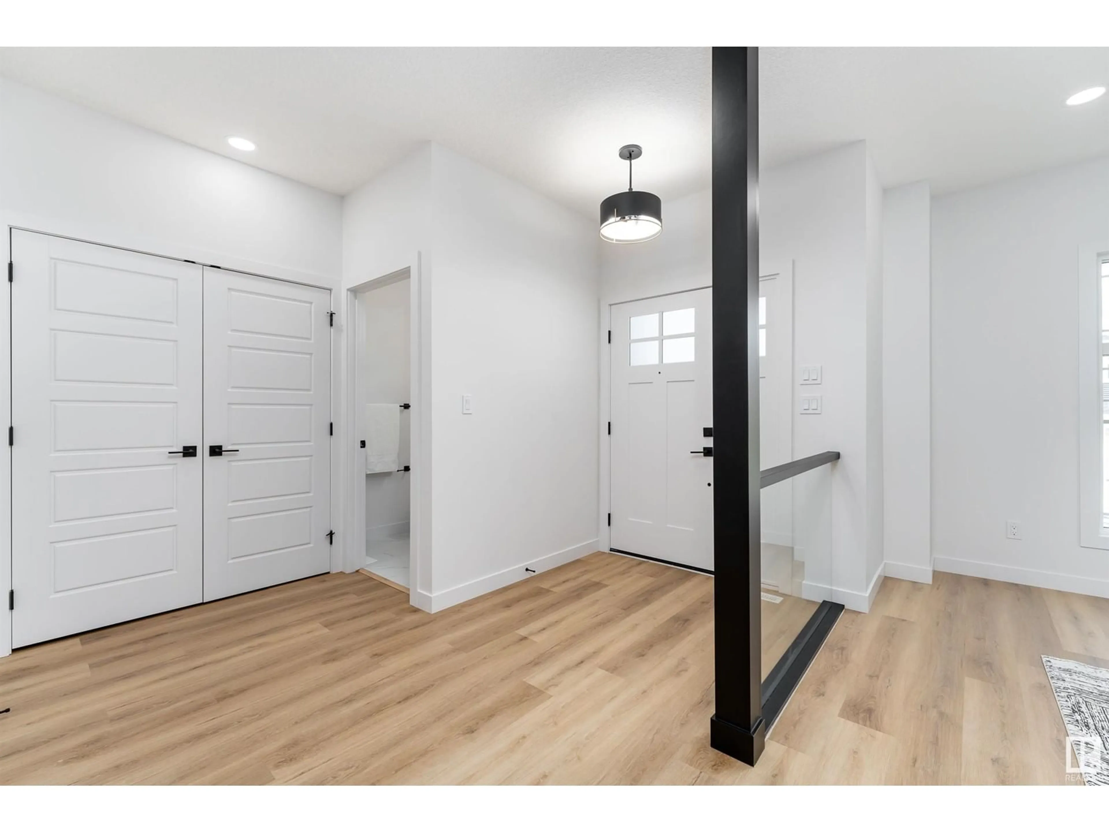 Indoor entryway, wood floors for 6923 JOHNNIE CAINE WY NW, Edmonton Alberta T5E6W4