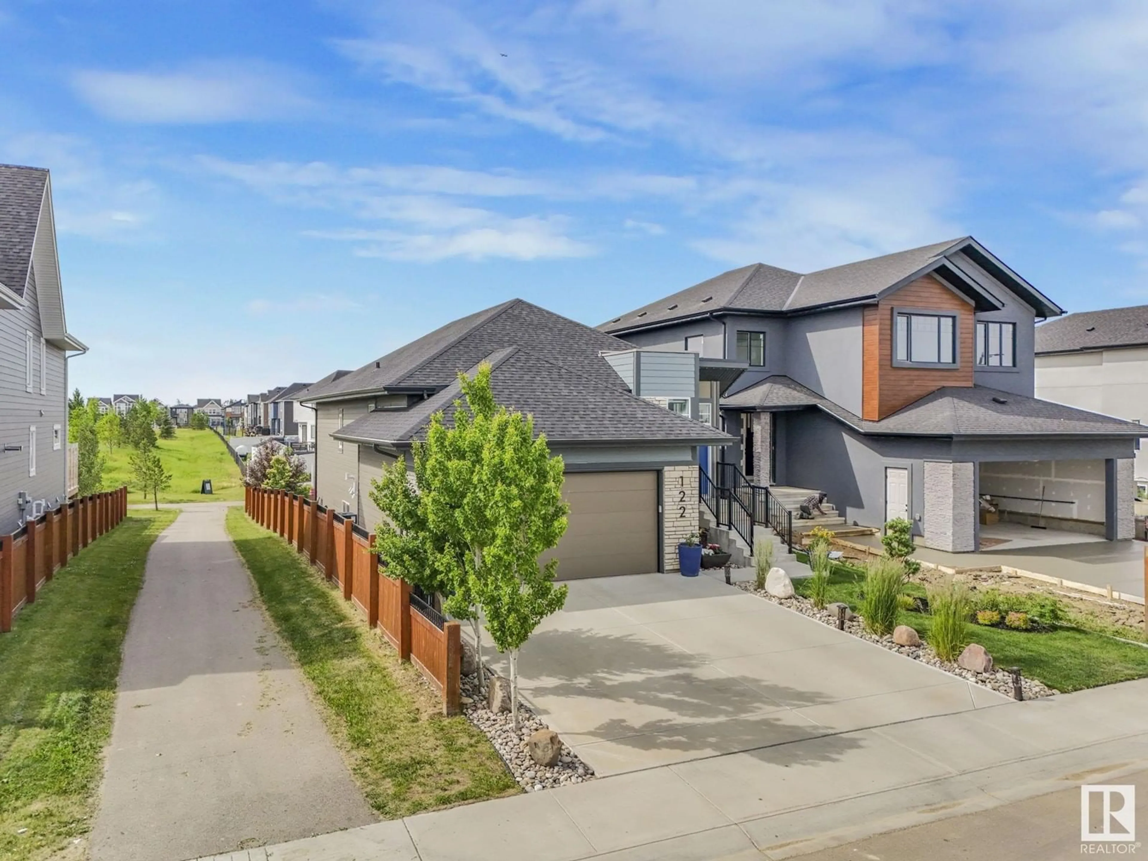 Frontside or backside of a home, the street view for 122 EDGEWATER CI, Leduc Alberta T9E1K5