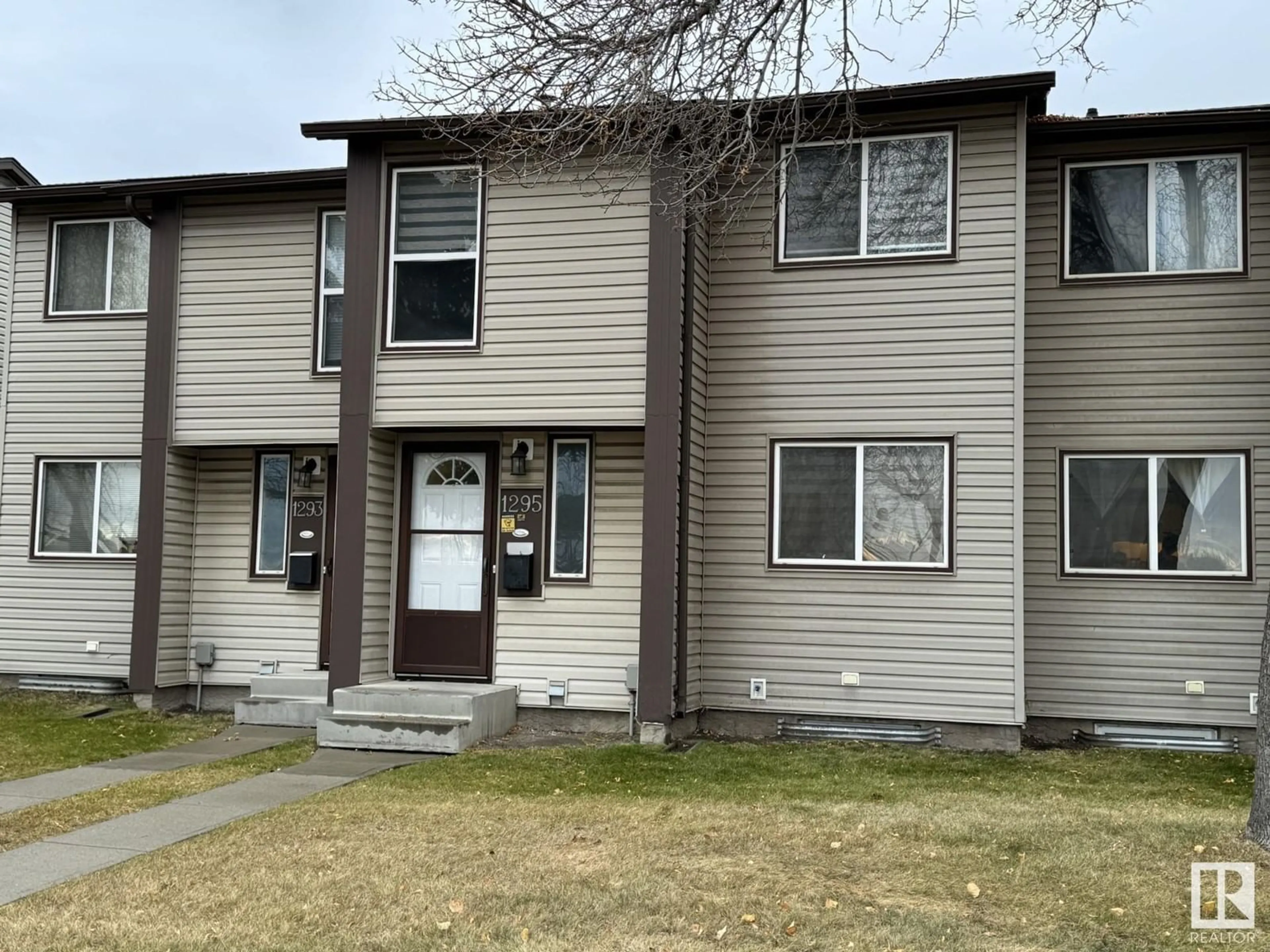 A pic from exterior of the house or condo, the front or back of building for 1295 HOOKE RD NW, Edmonton Alberta T5A4A5