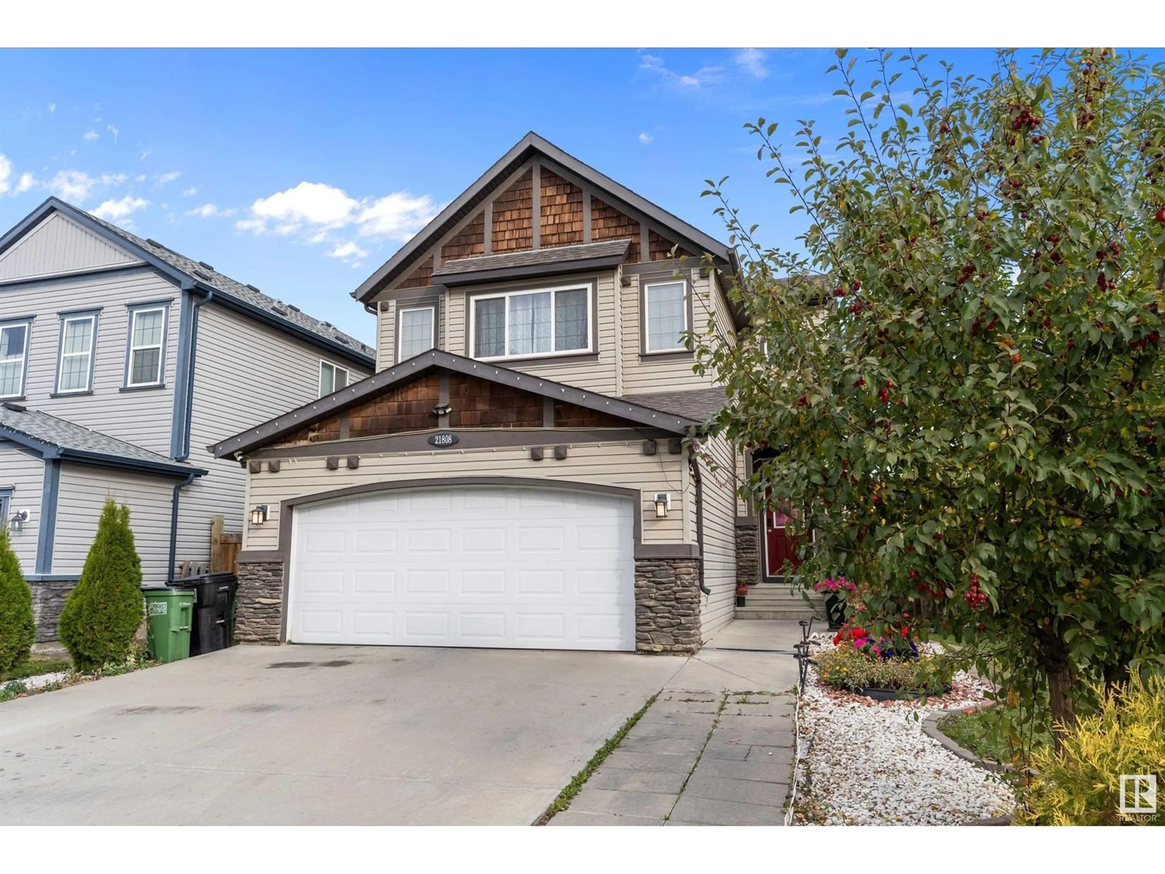 Frontside or backside of a home, the street view for 21808 97 AV NW, Edmonton Alberta T5T4H6