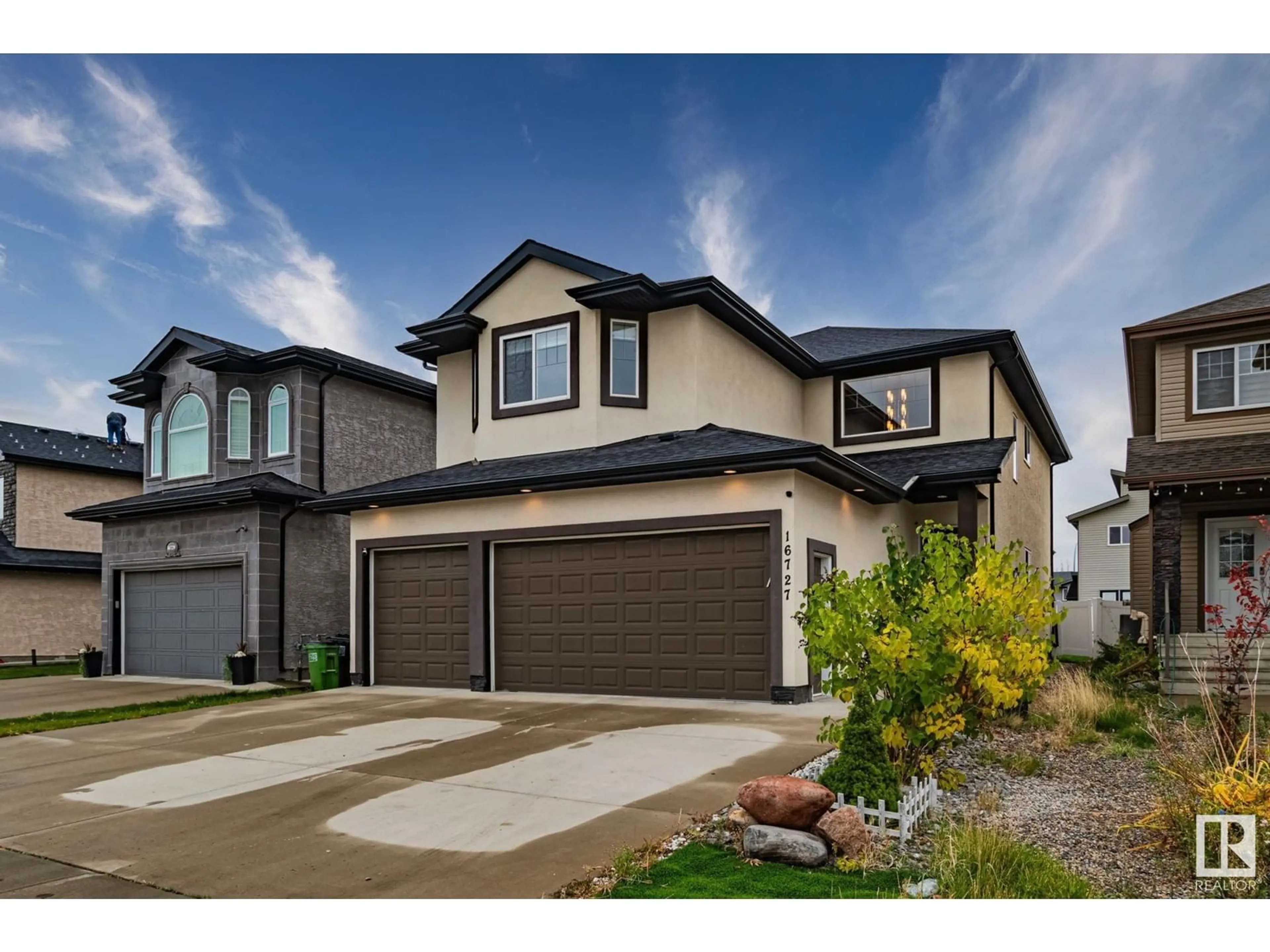 Frontside or backside of a home, the street view for 16727 61 St NW, Edmonton Alberta T5Y0W7