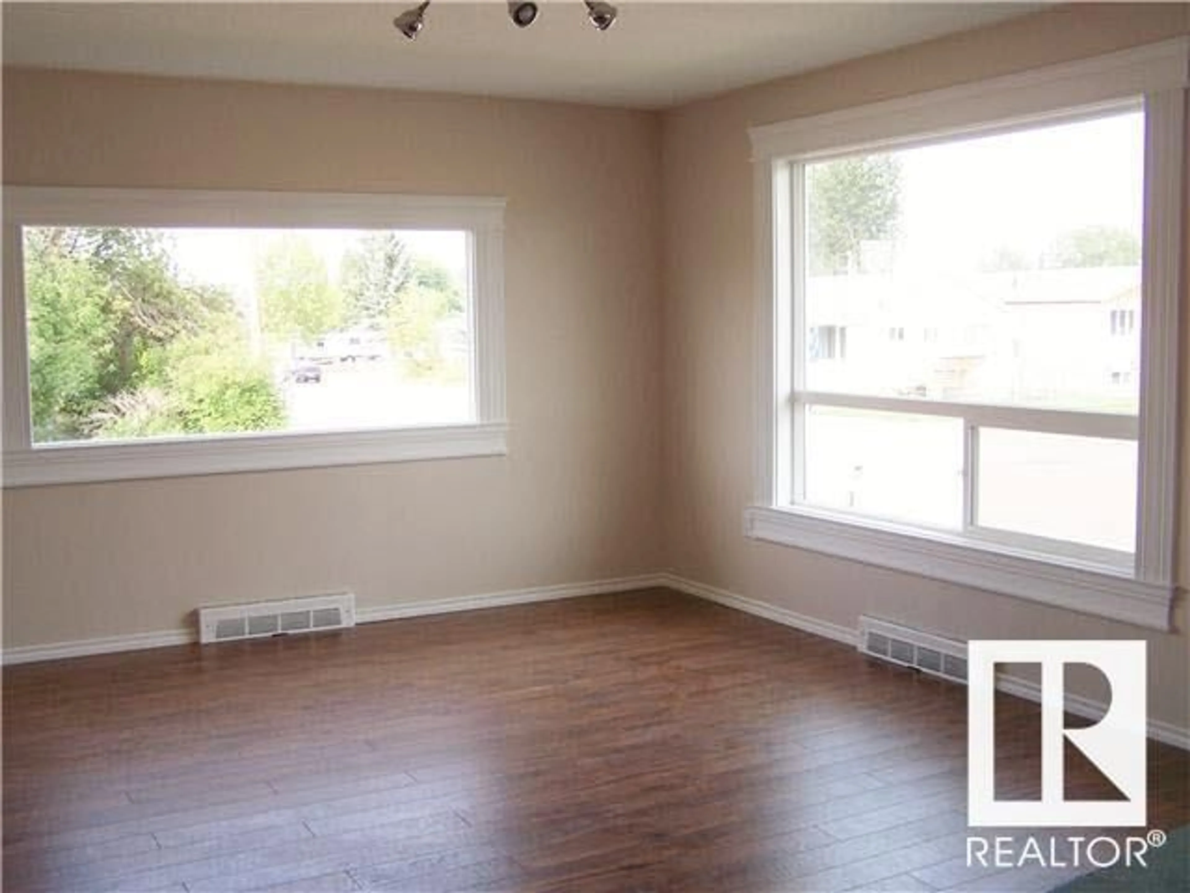 A pic of a room, wood floors for 4903 51 AV, Evansburg Alberta T0E0T0