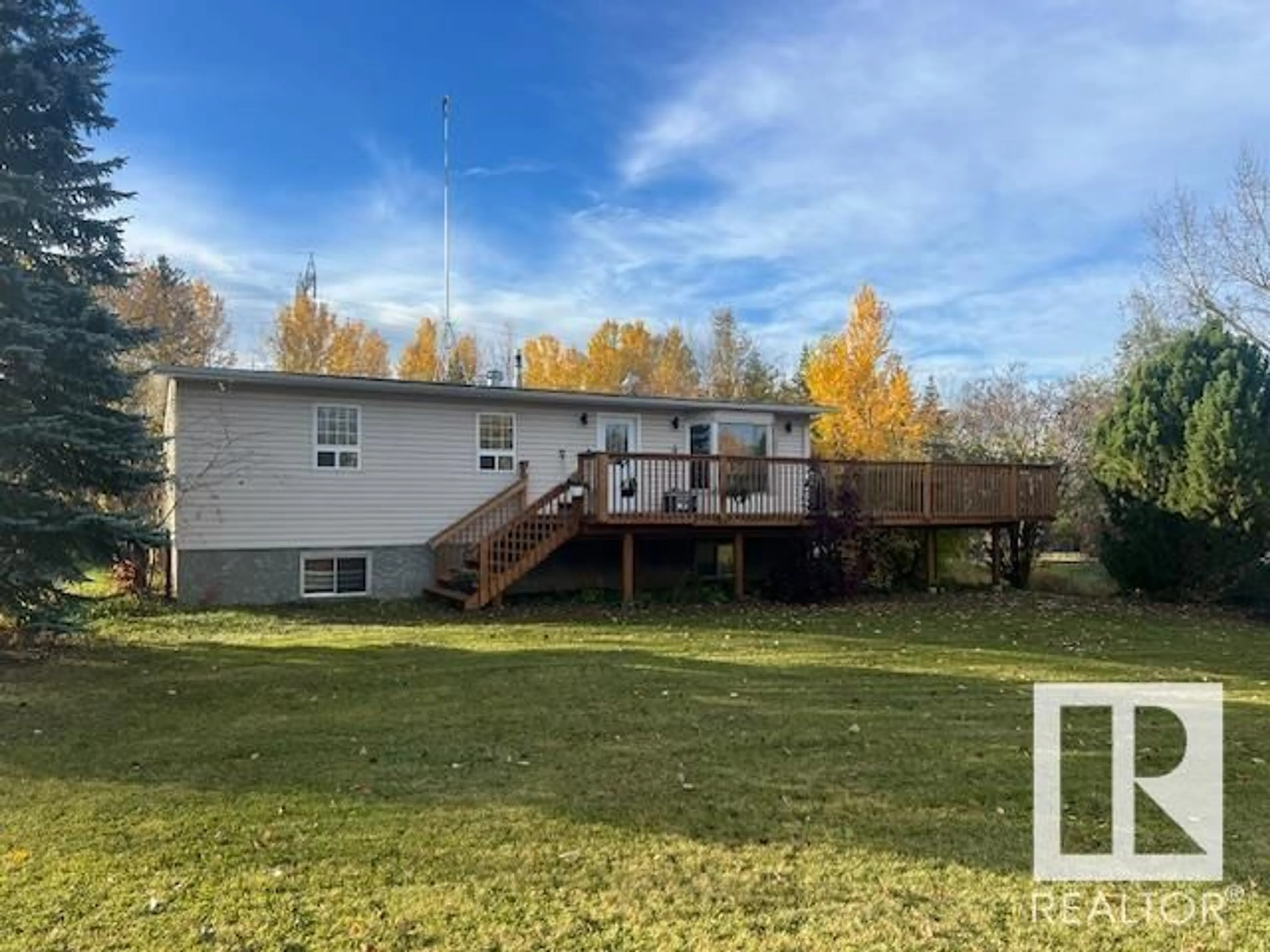 Frontside or backside of a home, the fenced backyard for #38 53221 RGE ROAD 25, Rural Parkland County Alberta T7Y0E1