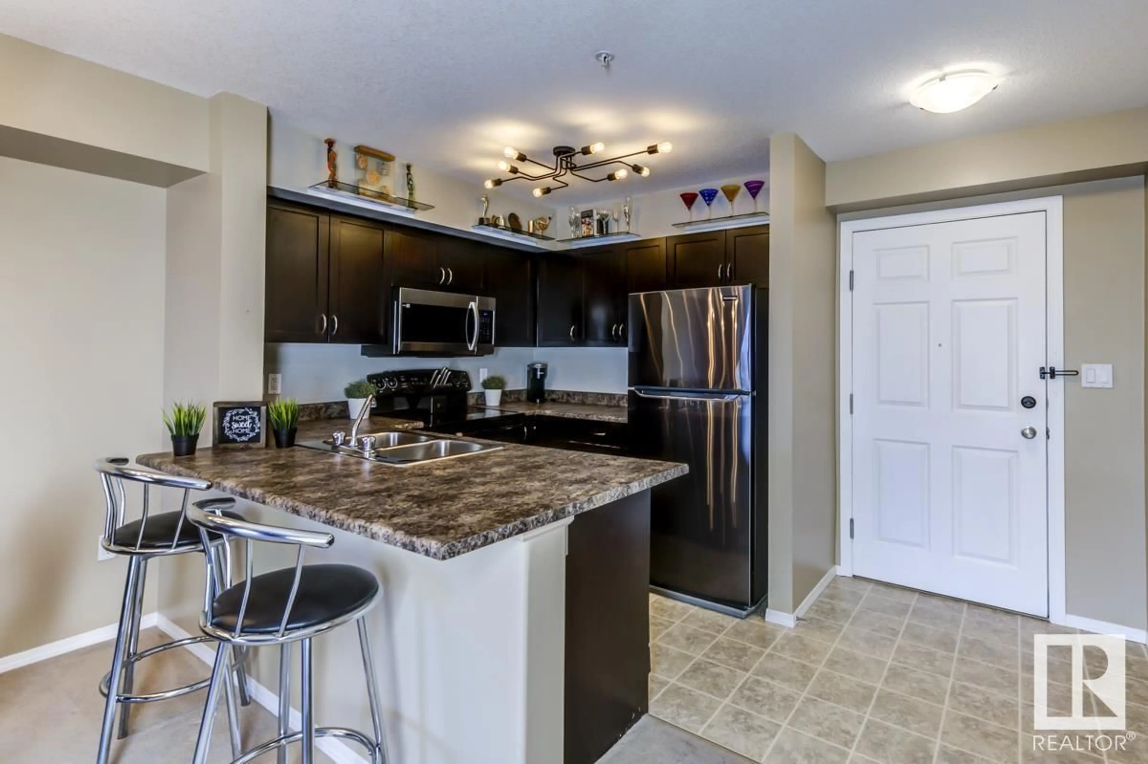 Open concept kitchen for #220 42 SUMMERWOOD BV, Sherwood Park Alberta T8H0C3