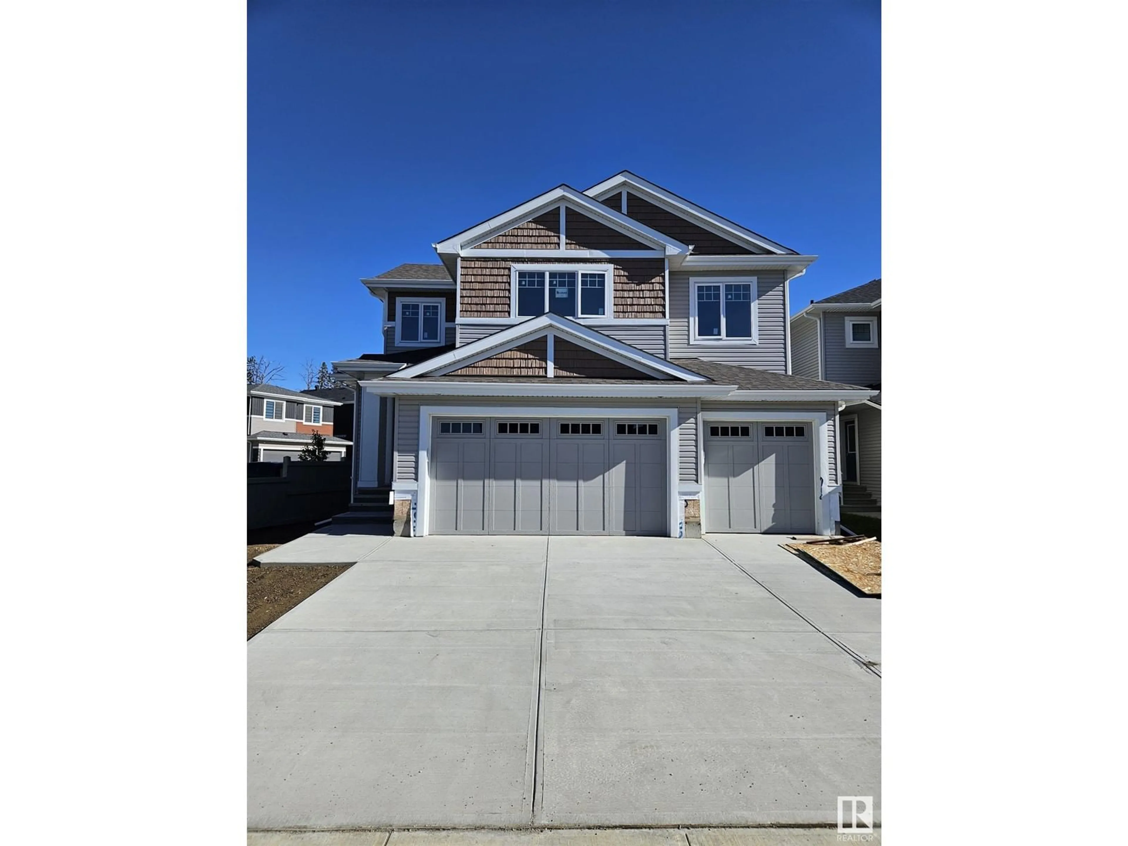 Frontside or backside of a home, the street view for 3235 4 ST NW, Edmonton Alberta T6T1J2