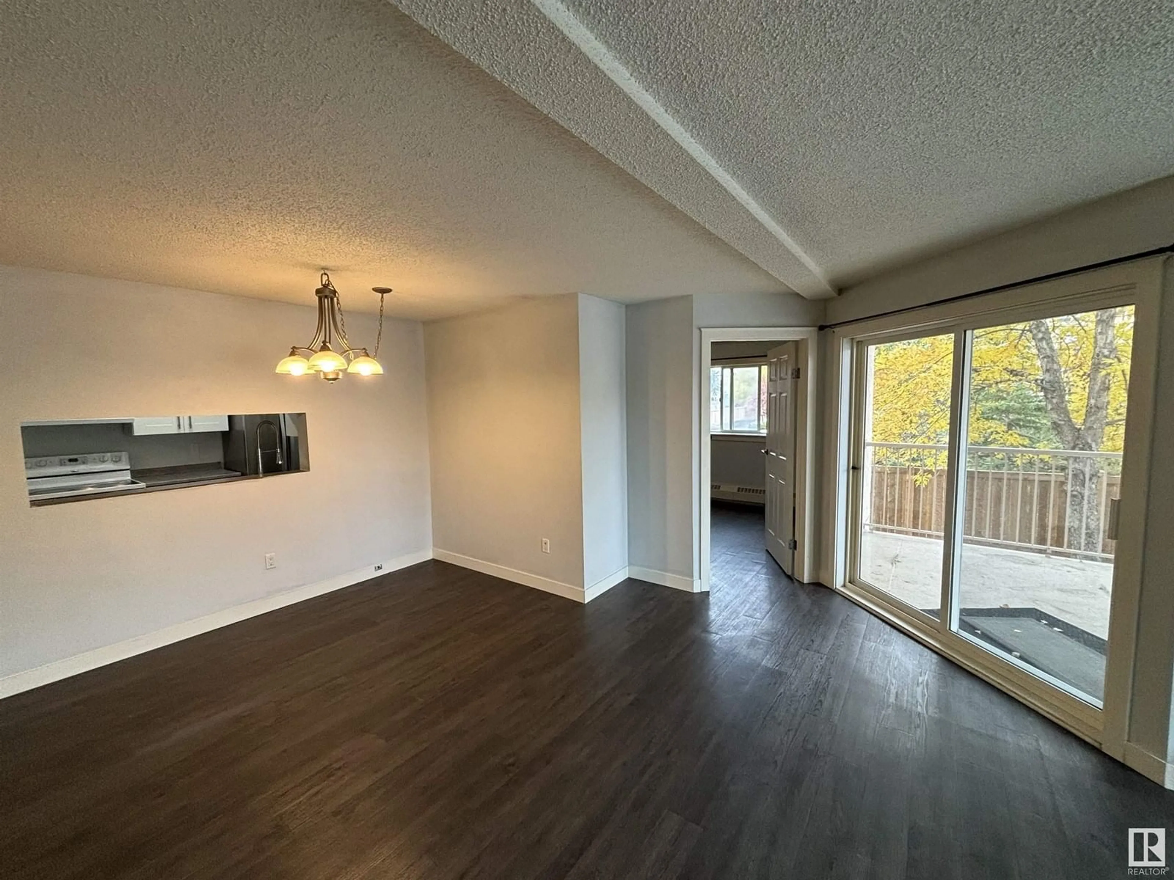 A pic of a room, wood floors for #217 17109 67 AV NW, Edmonton Alberta T5T6E6