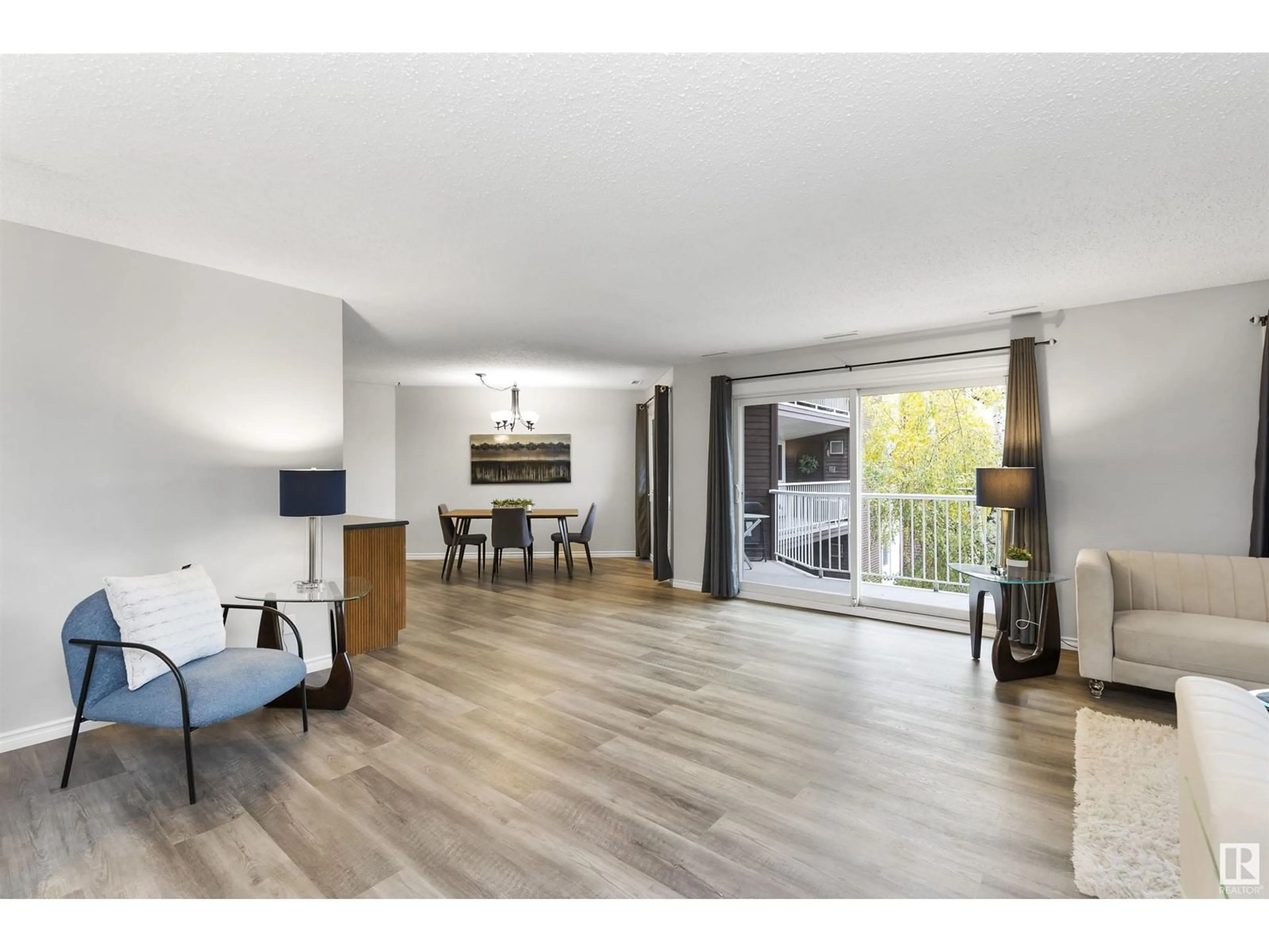 A pic of a room, wood floors for #309 14810 51 AV NW, Edmonton Alberta T6H5G5