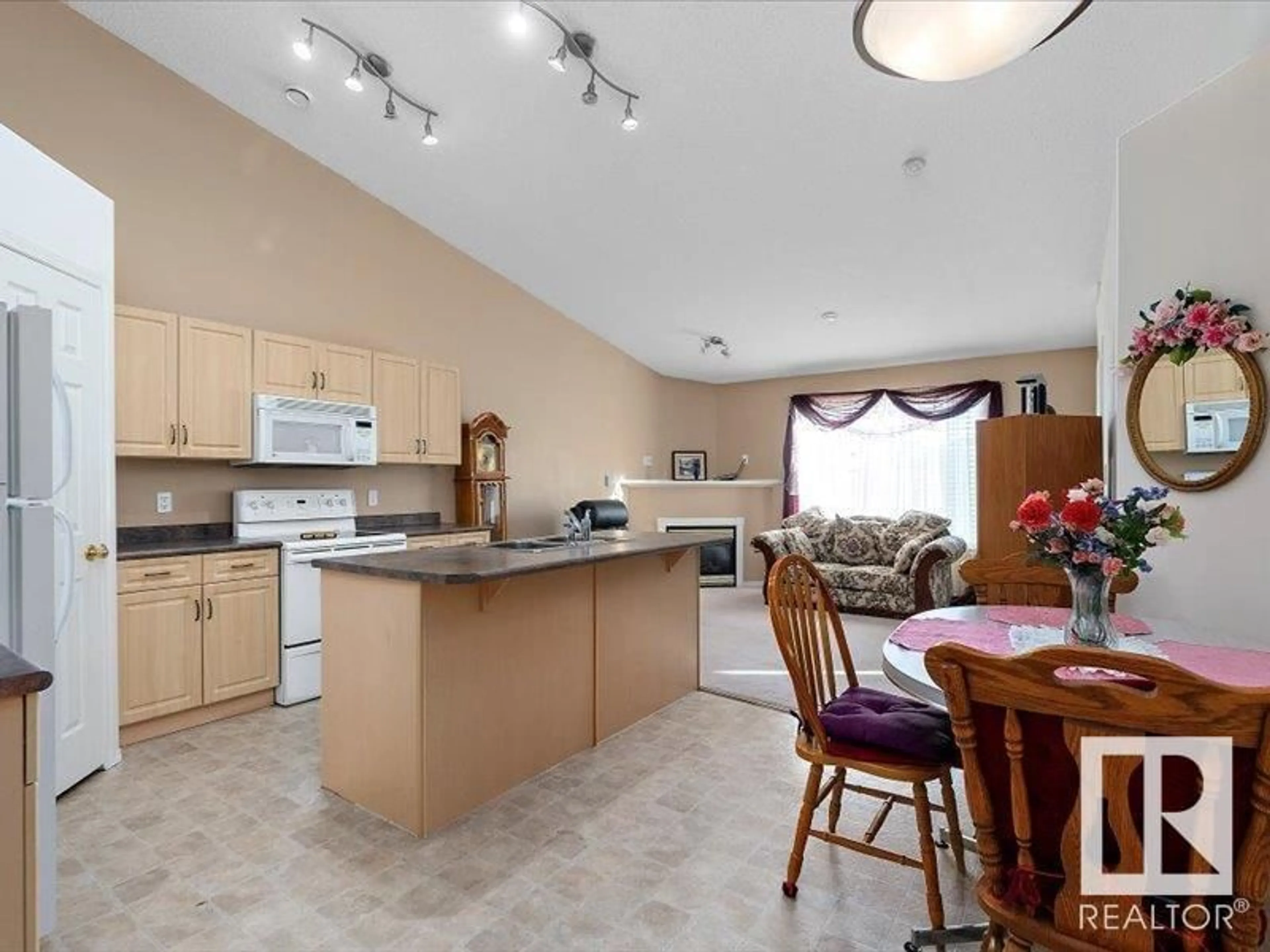 Open concept kitchen for #16 4527 55 AV, Tofield Alberta T0B4J0