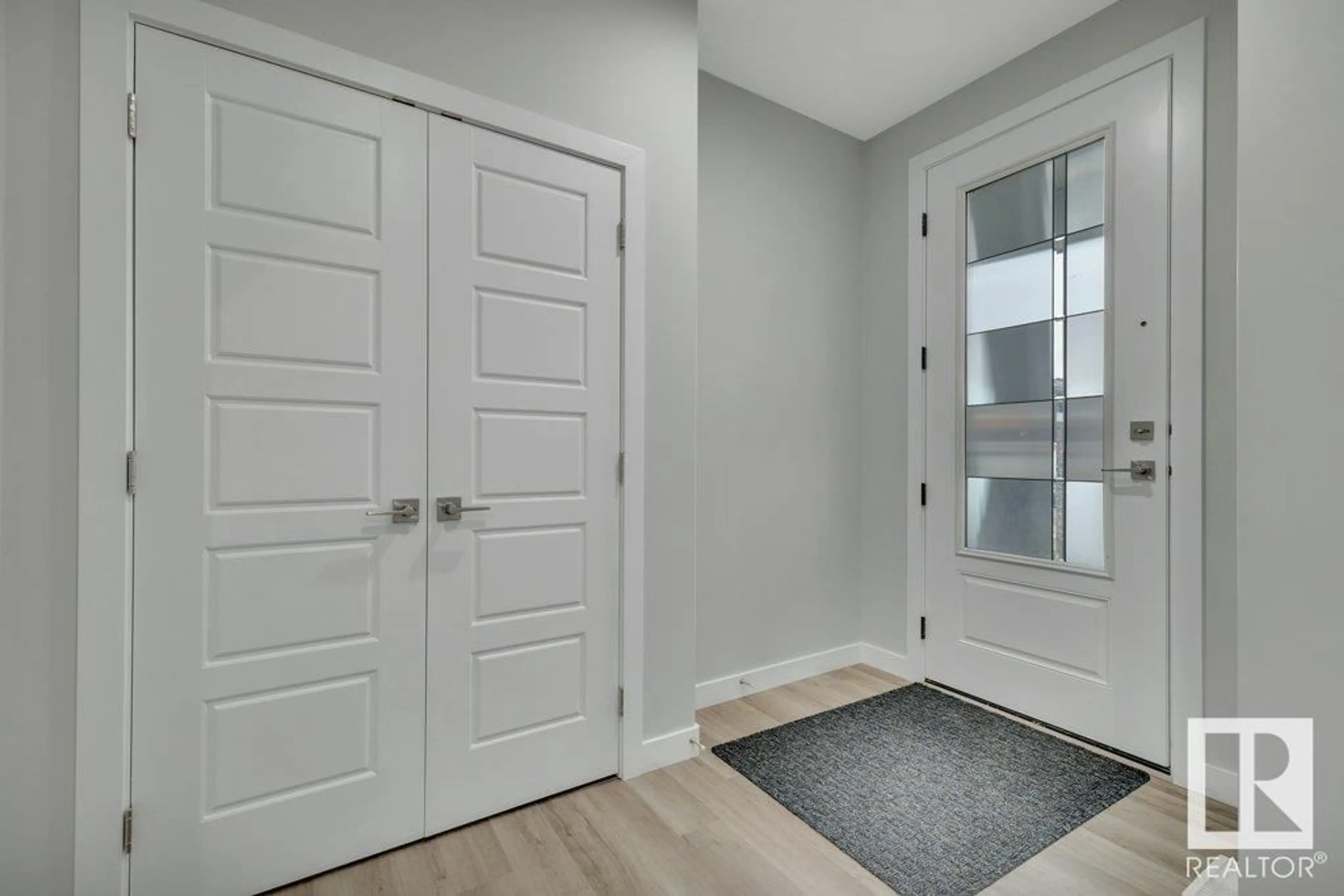 Indoor entryway, wood floors for 16007 34 AV SW, Edmonton Alberta T6W4V7