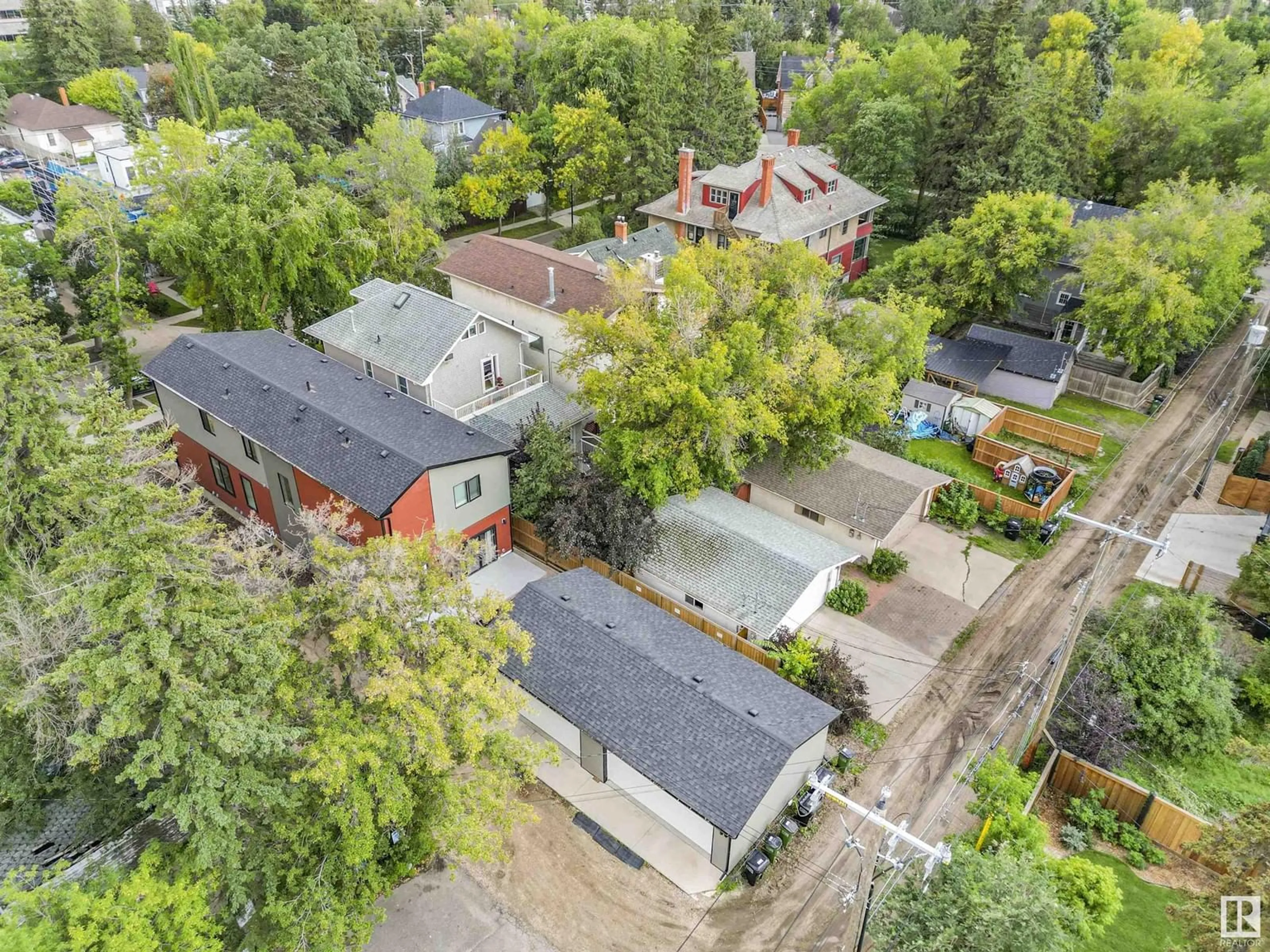 Frontside or backside of a home, the fenced backyard for 10426 126 ST NW, Edmonton Alberta T5N1T8