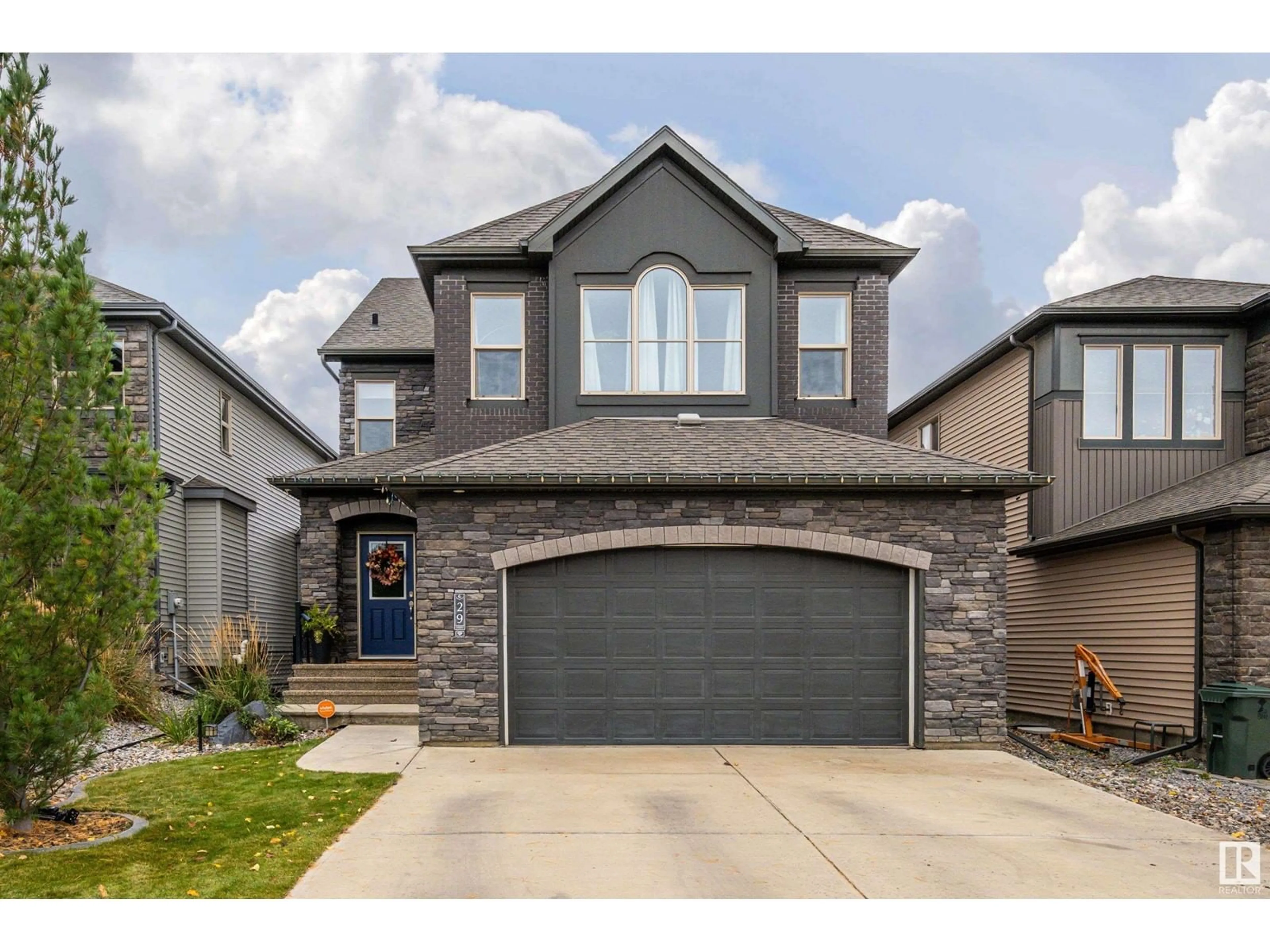 Frontside or backside of a home, the street view for 29 GARNEAU GA, Spruce Grove Alberta T7X0M6