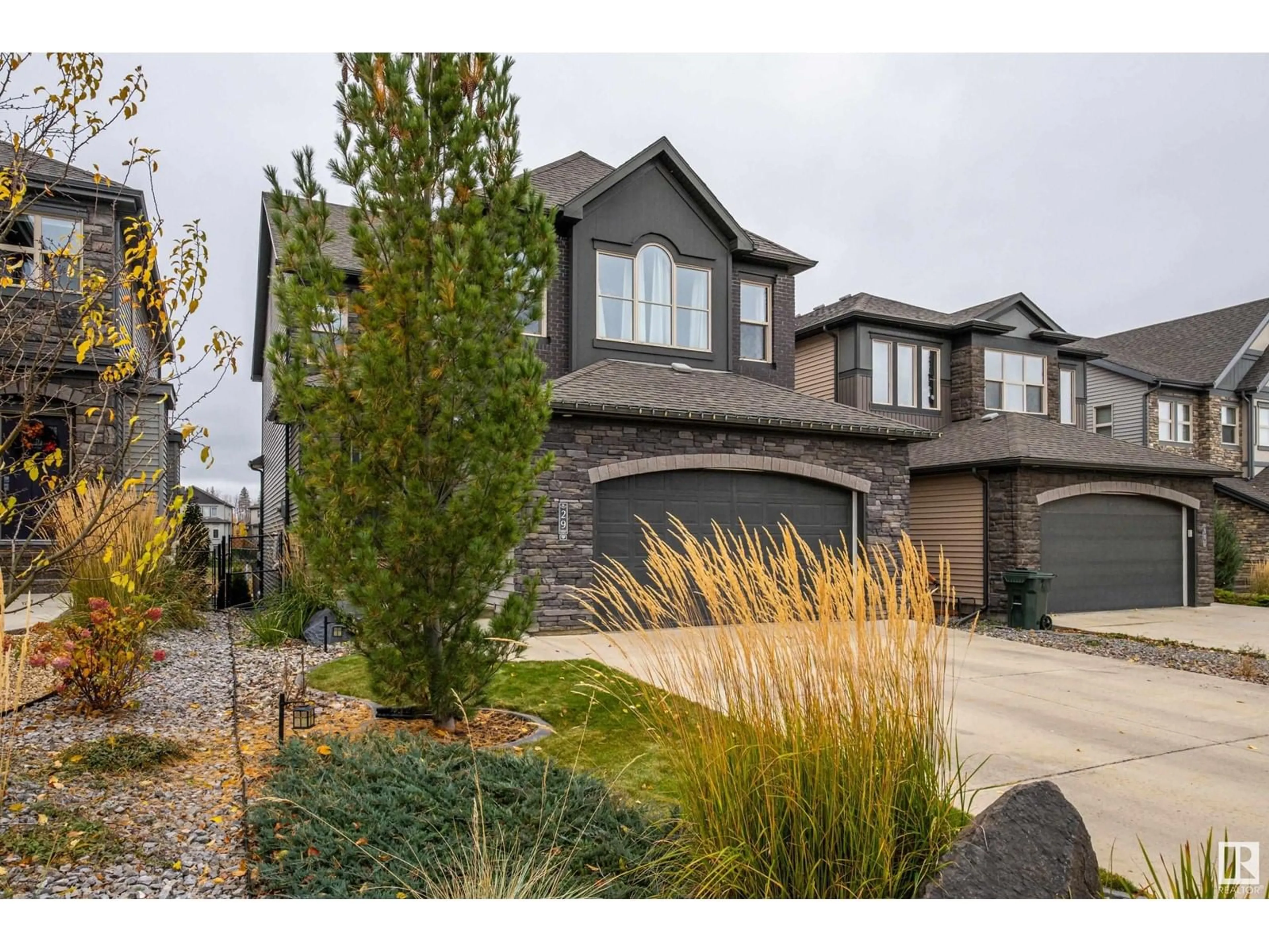 Frontside or backside of a home, the street view for 29 GARNEAU GA, Spruce Grove Alberta T7X0M6