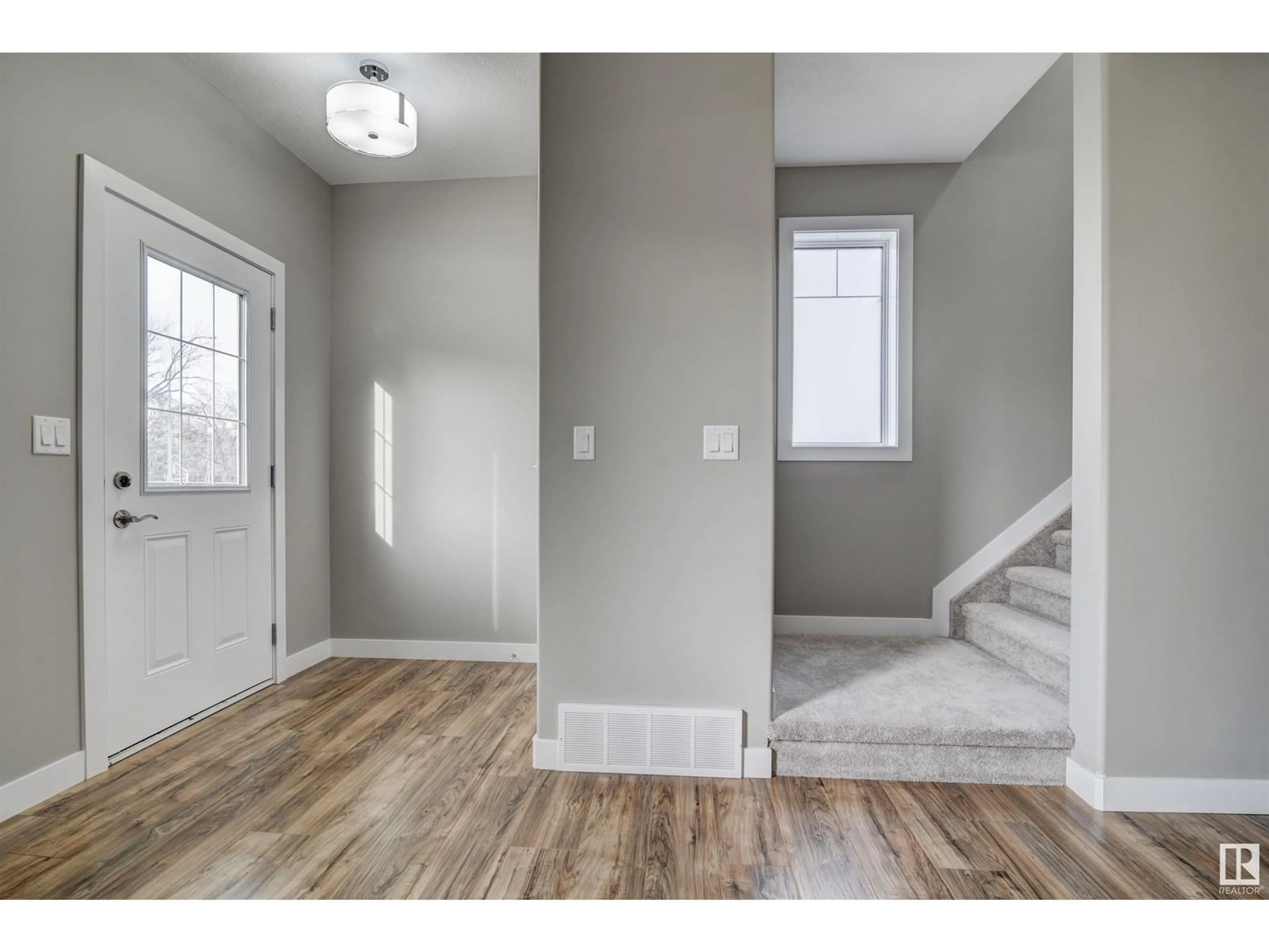 Indoor entryway, wood floors for 10359 149 ST NW, Edmonton Alberta T5P1L4