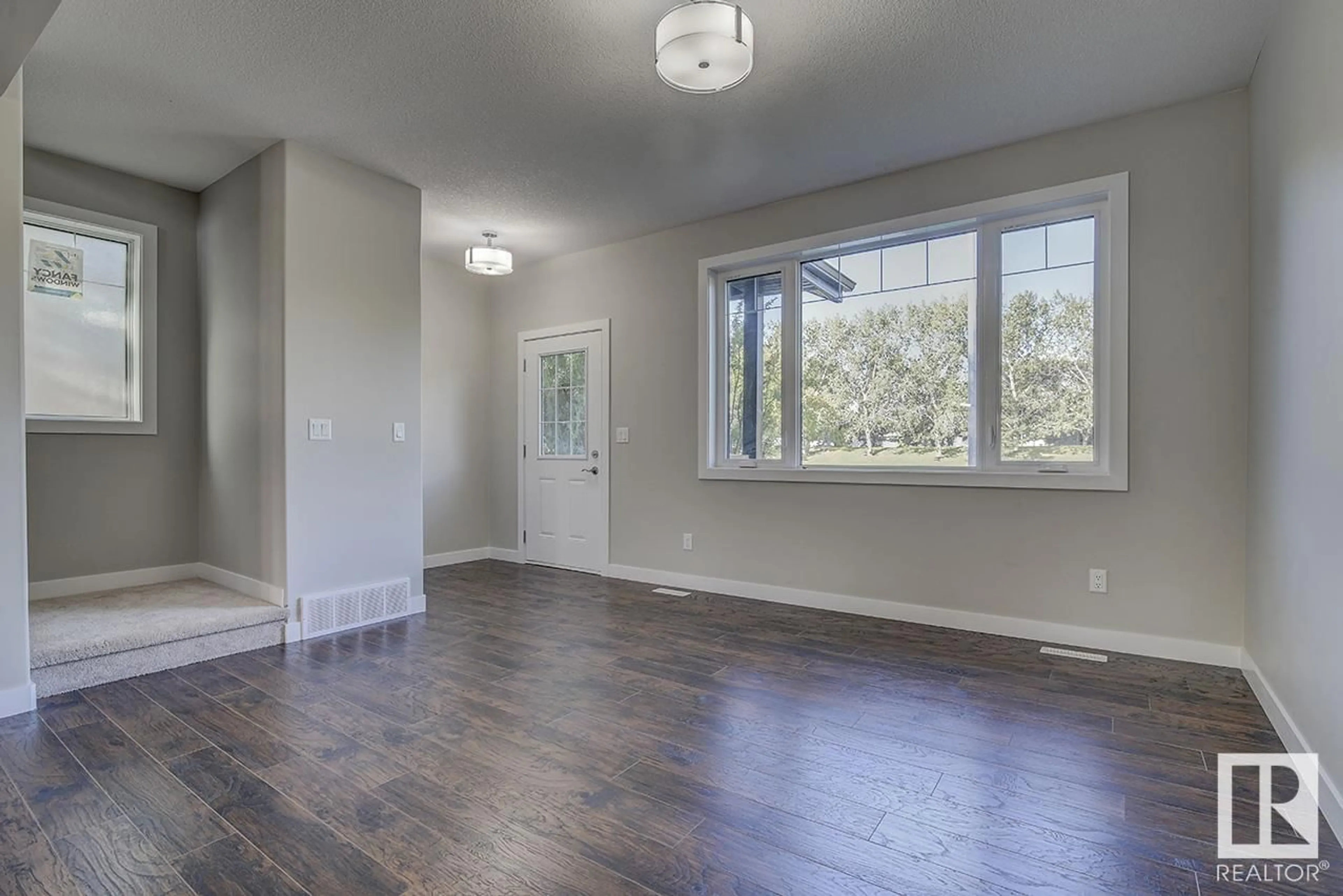 Indoor entryway, wood floors for 10357 149 ST NW, Edmonton Alberta T5P1L4