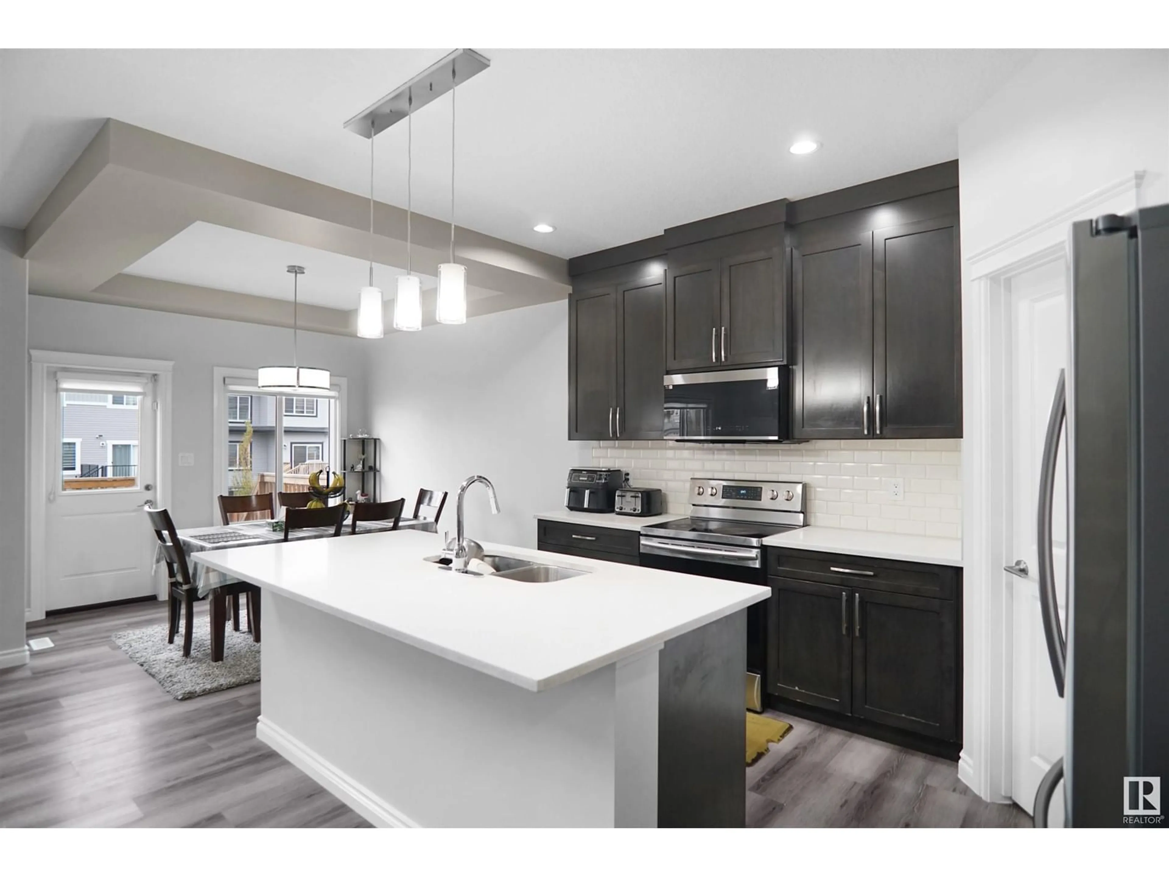 Open concept kitchen for 9325 COOPER BN SW, Edmonton Alberta T6W4A4