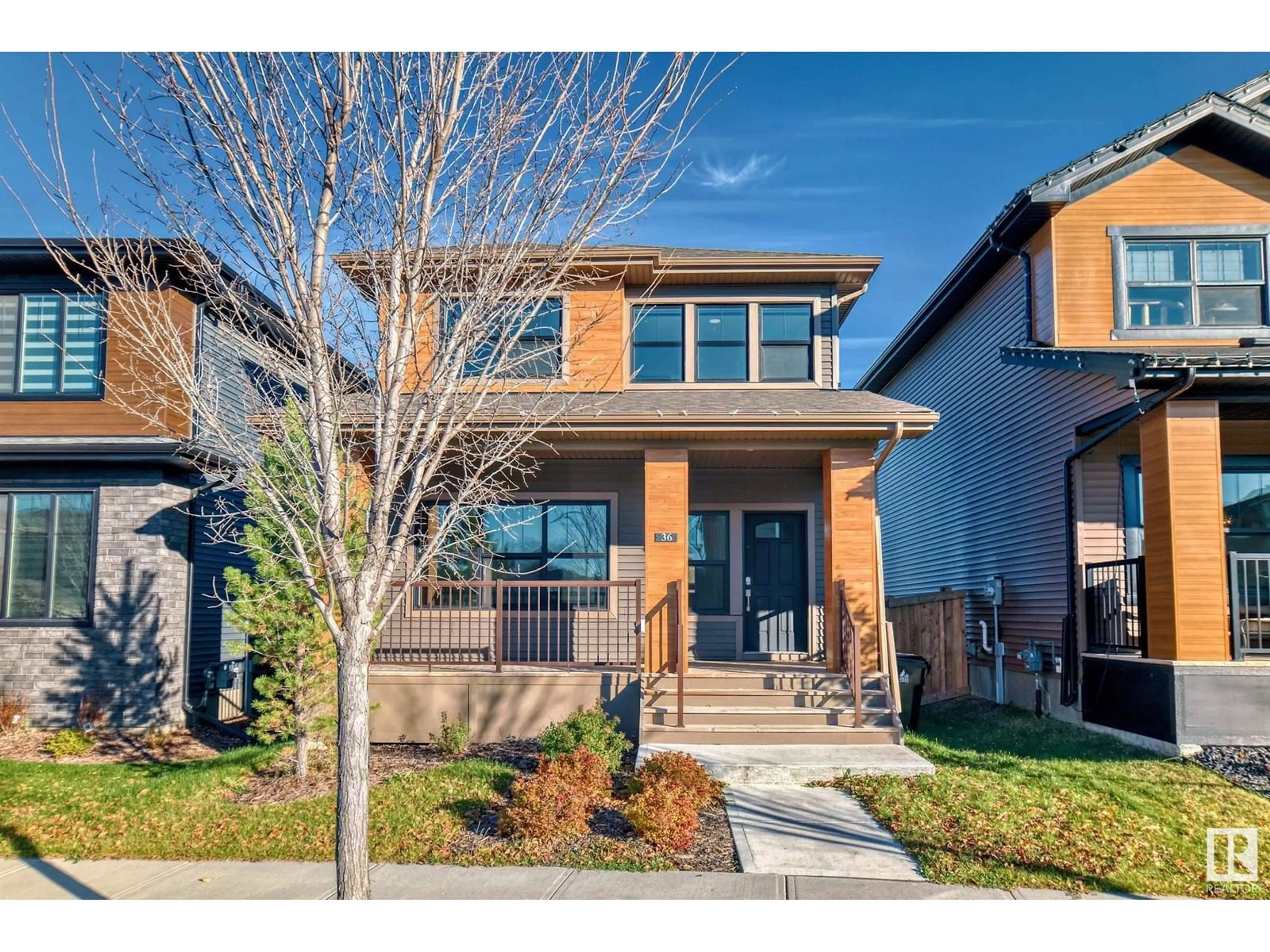 Frontside or backside of a home, the street view for 36 TENOR LI, Spruce Grove Alberta T7X0X7