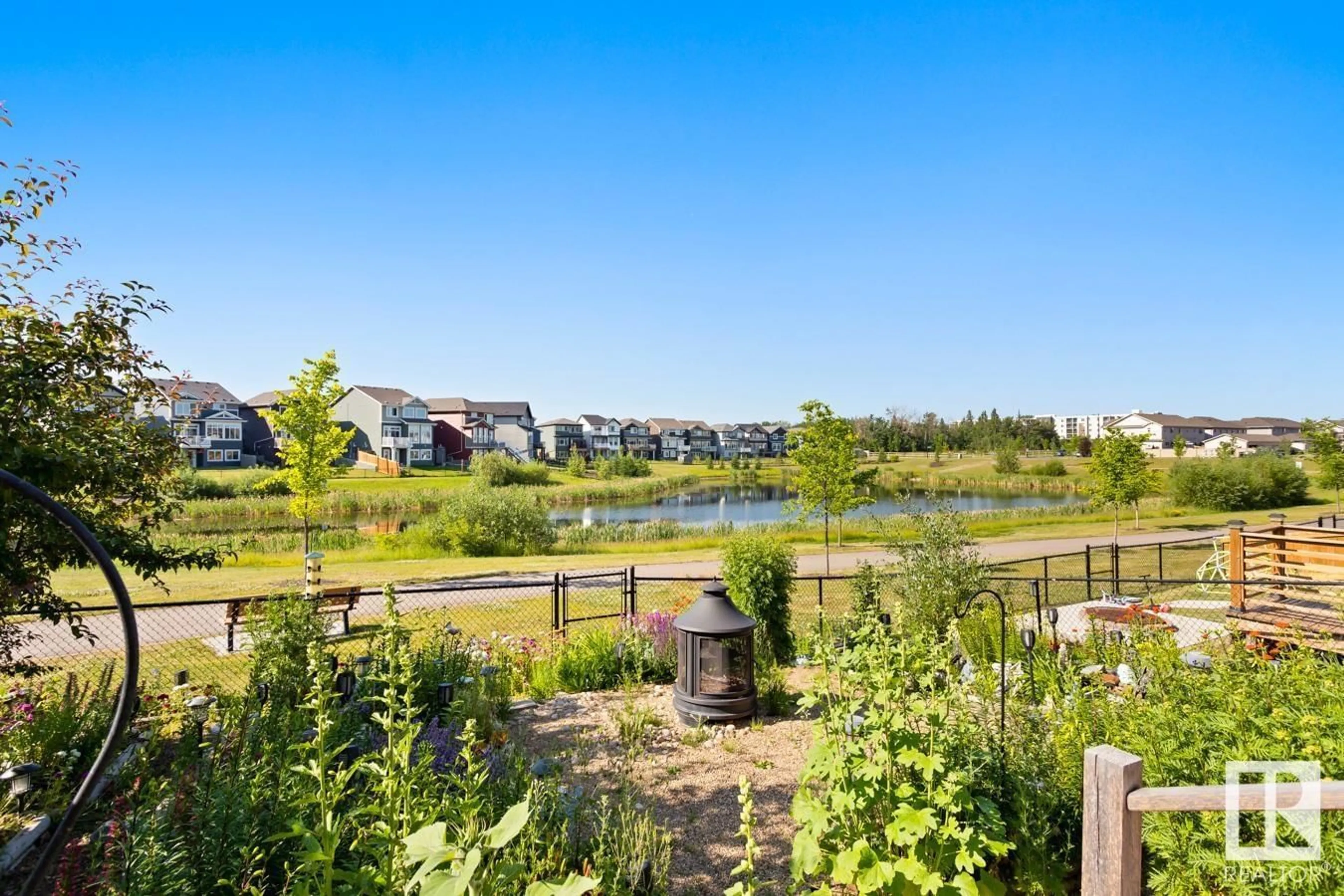 A pic from exterior of the house or condo, the fenced backyard for 811 EAGLESON LI NW, Edmonton Alberta T6M0V5