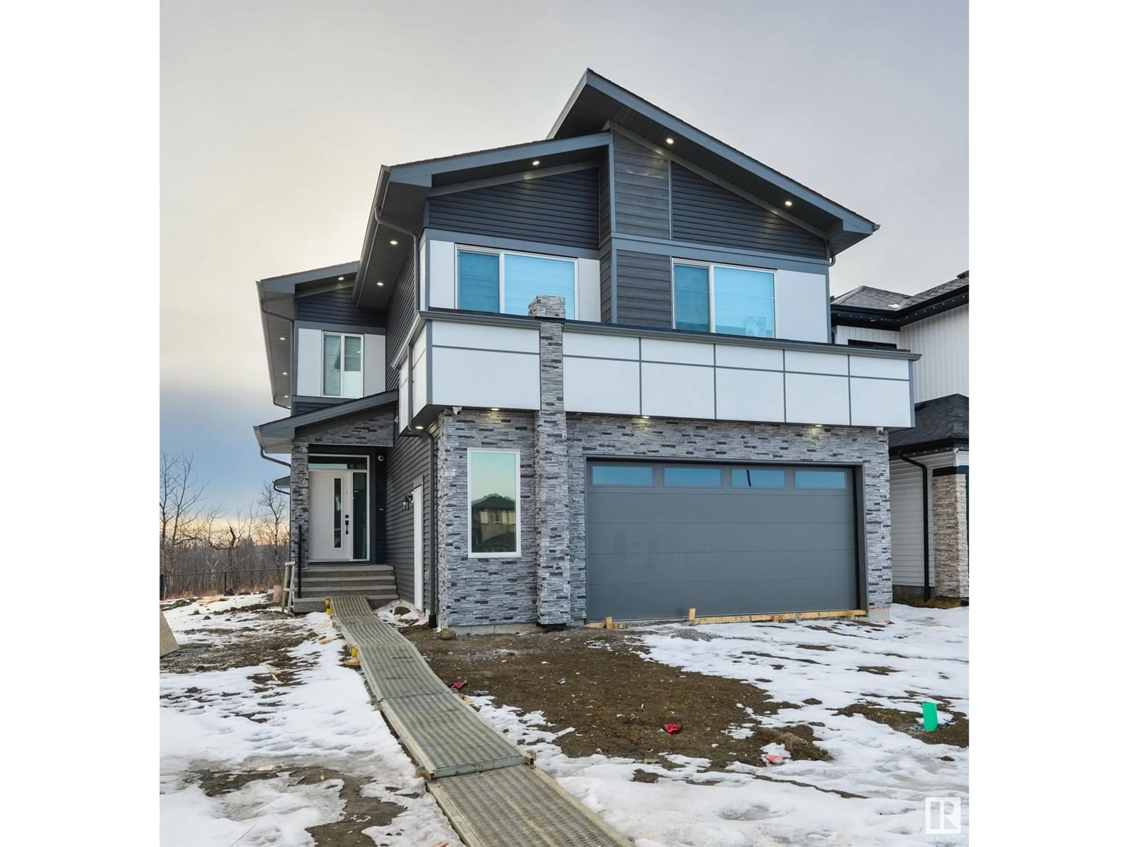 A pic from exterior of the house or condo, the street view for 1323 155 ST SW, Edmonton Alberta T6W5J5