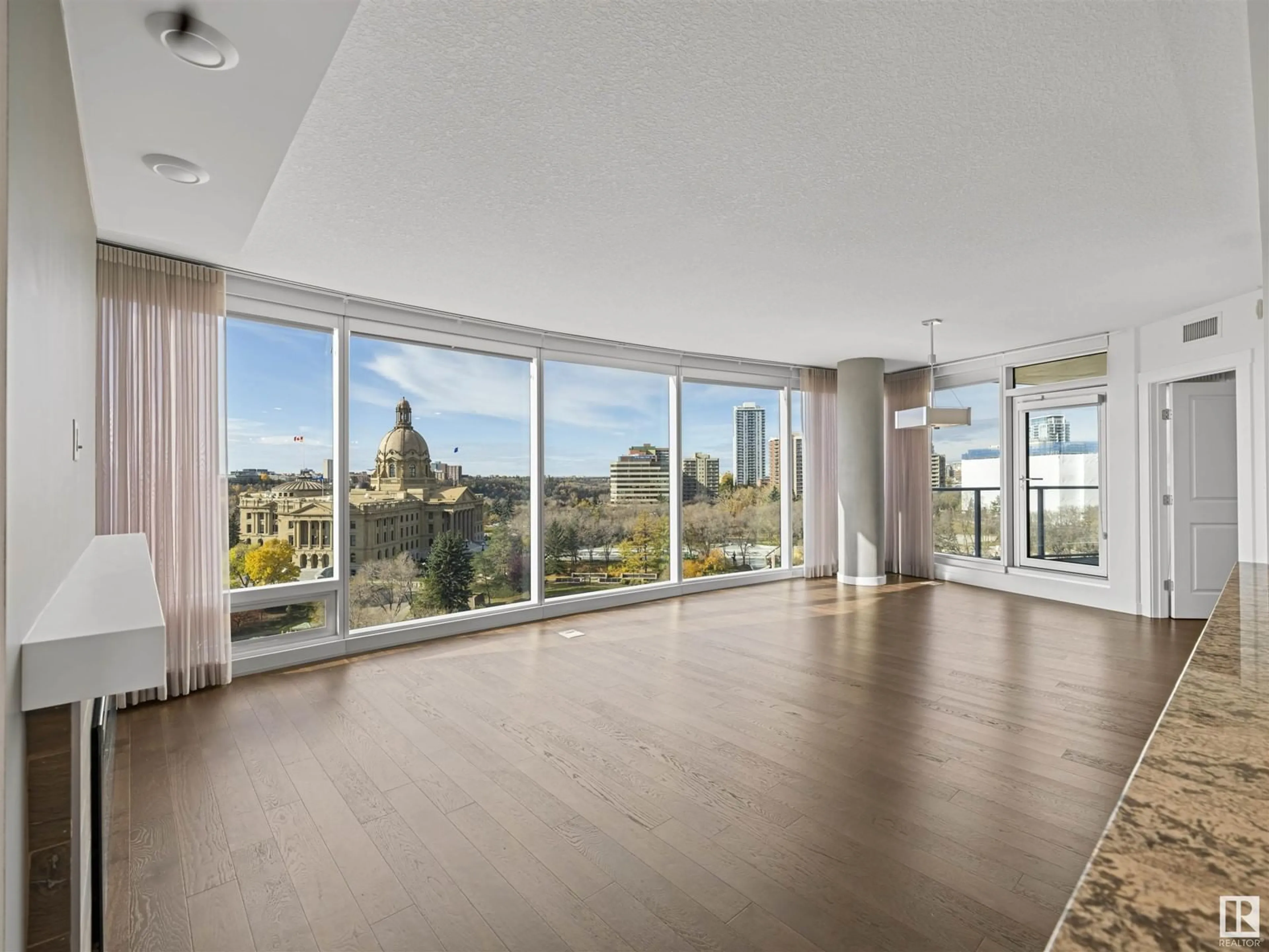 A pic of a room, wood floors for #1407 9720 106 ST NW, Edmonton Alberta T5K0K8