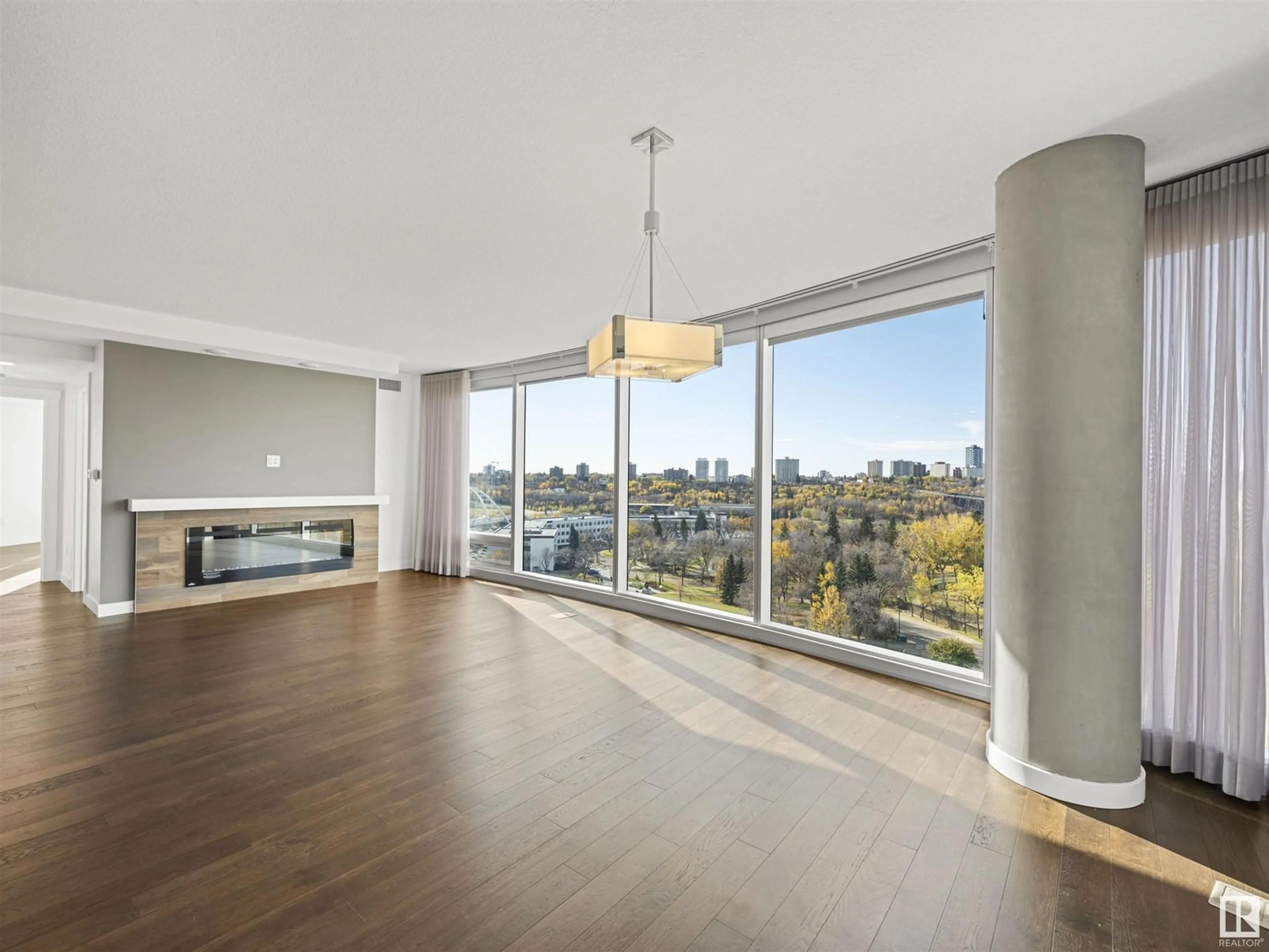 A pic of a room, wood floors for #1407 9720 106 ST NW, Edmonton Alberta T5K0K8