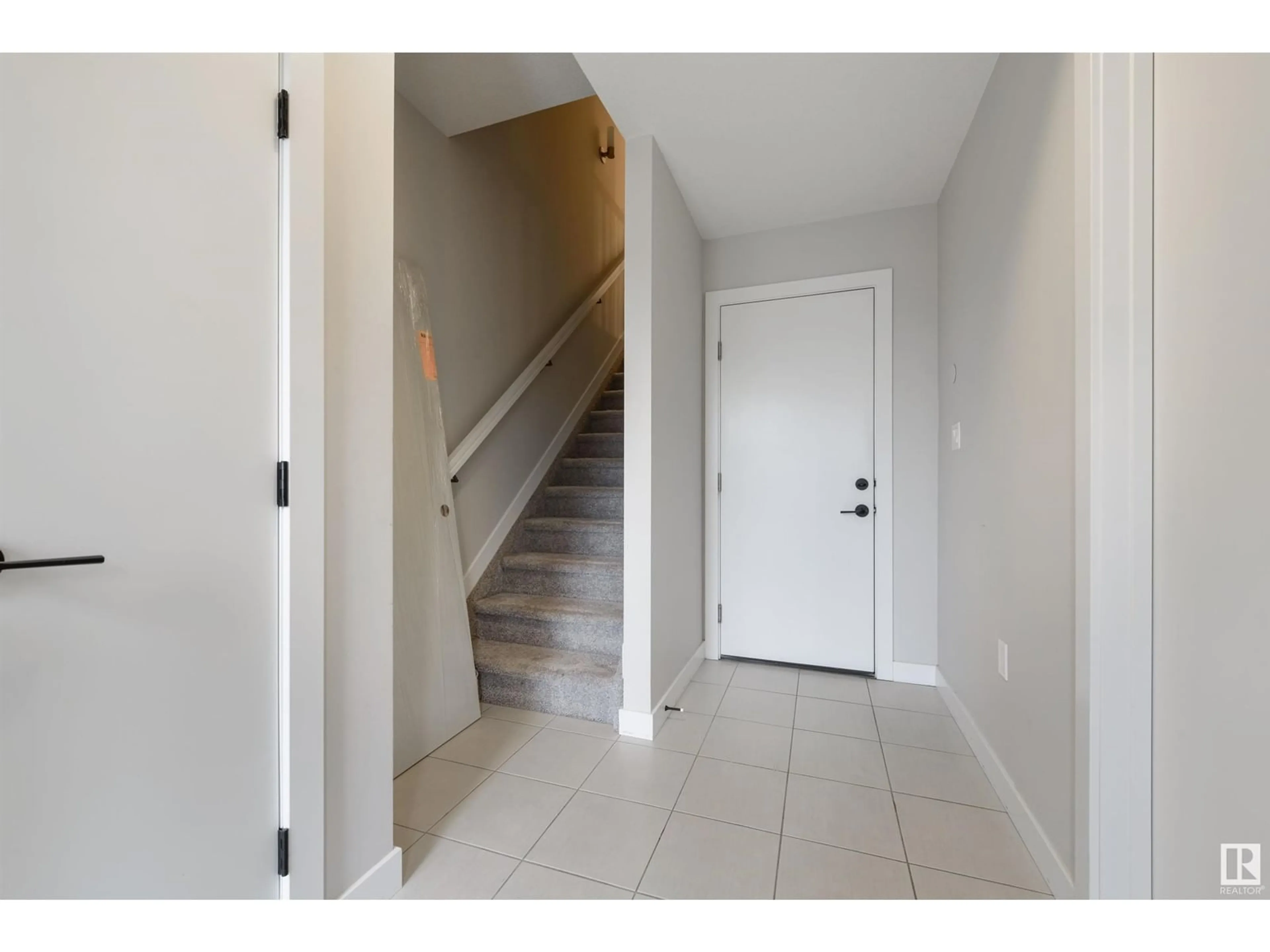 Indoor entryway, wood floors for 1111 KESWICK DR SW, Edmonton Alberta T6W4B6