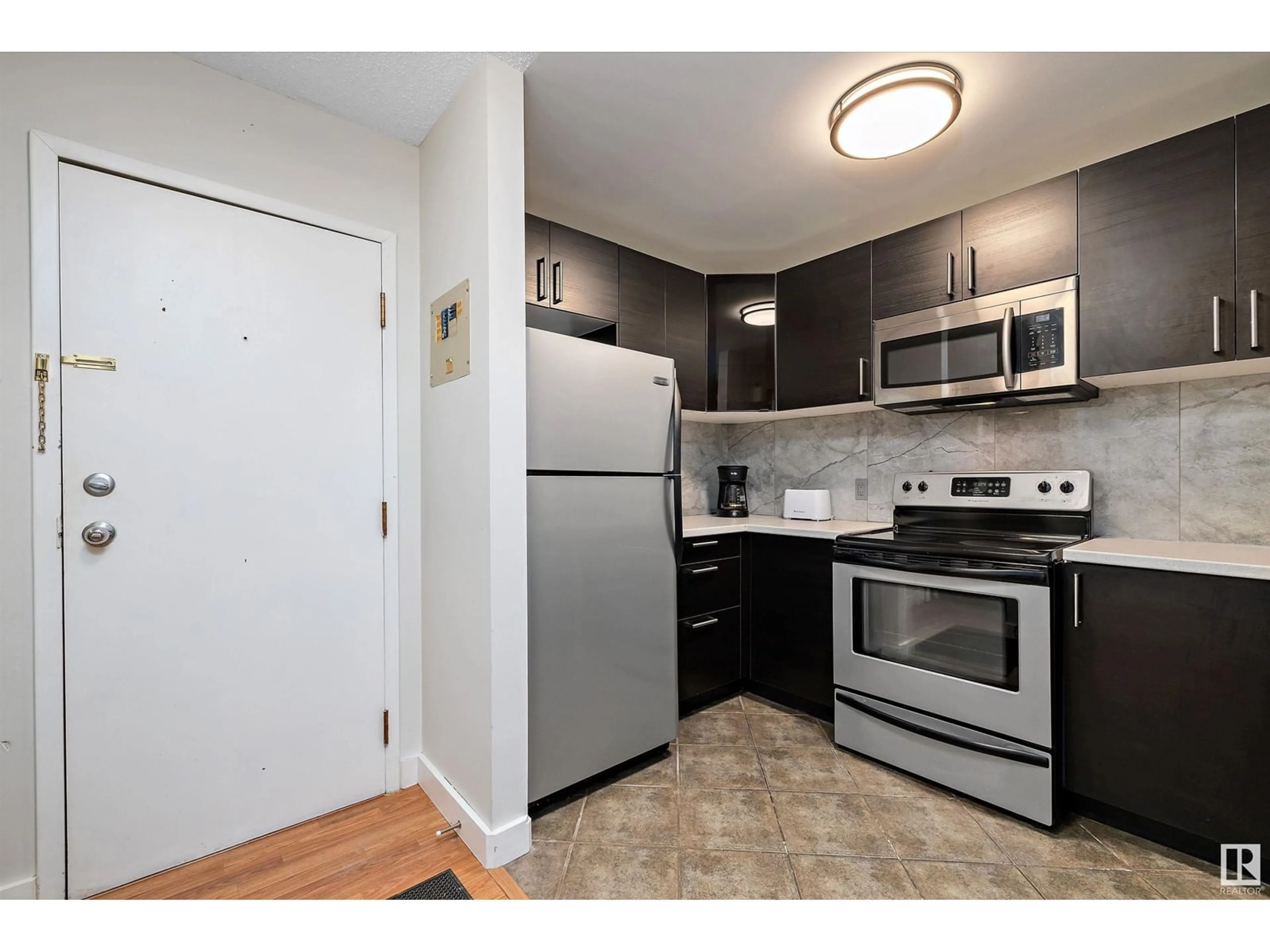 Standard kitchen, wood floors for #205 14916 26 ST NW, Edmonton Alberta T5Y2G4