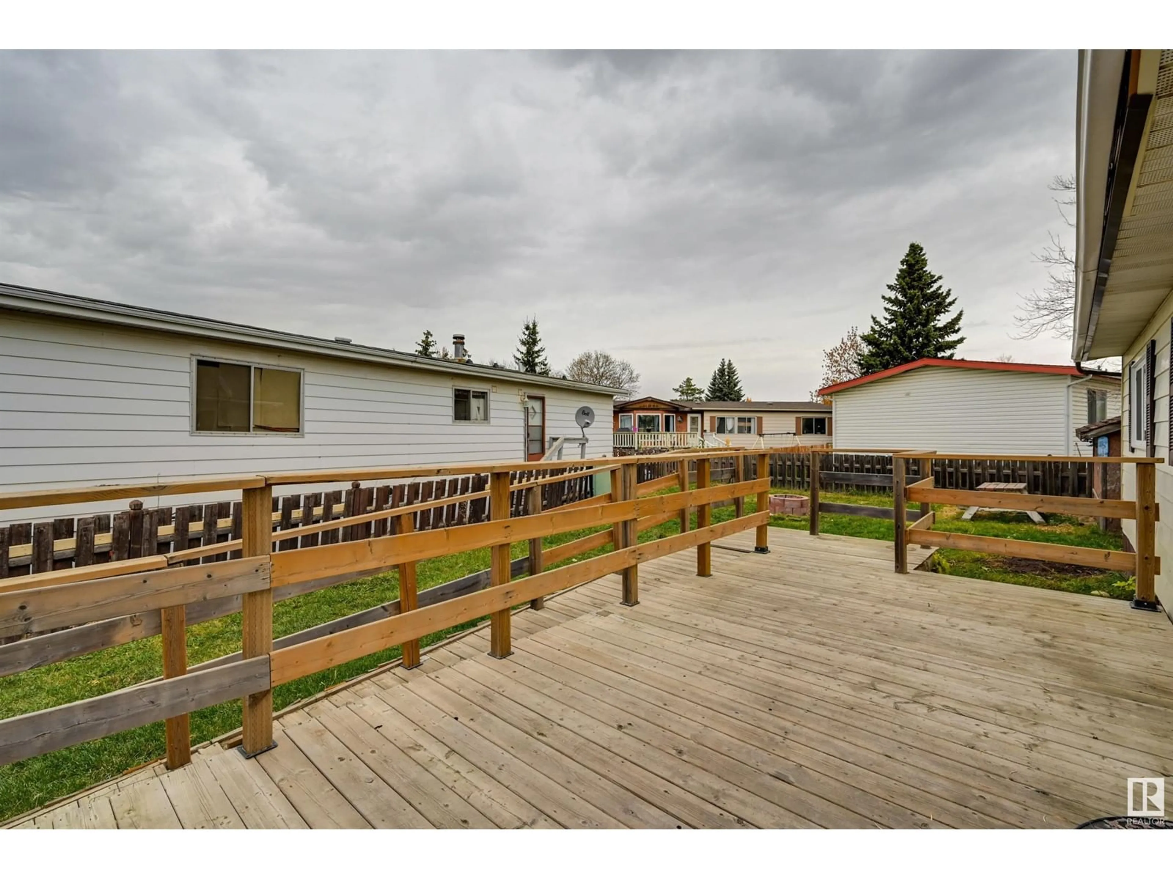 Patio, the fenced backyard for 46 MAPLE TC NW NW, Edmonton Alberta T6P1H6