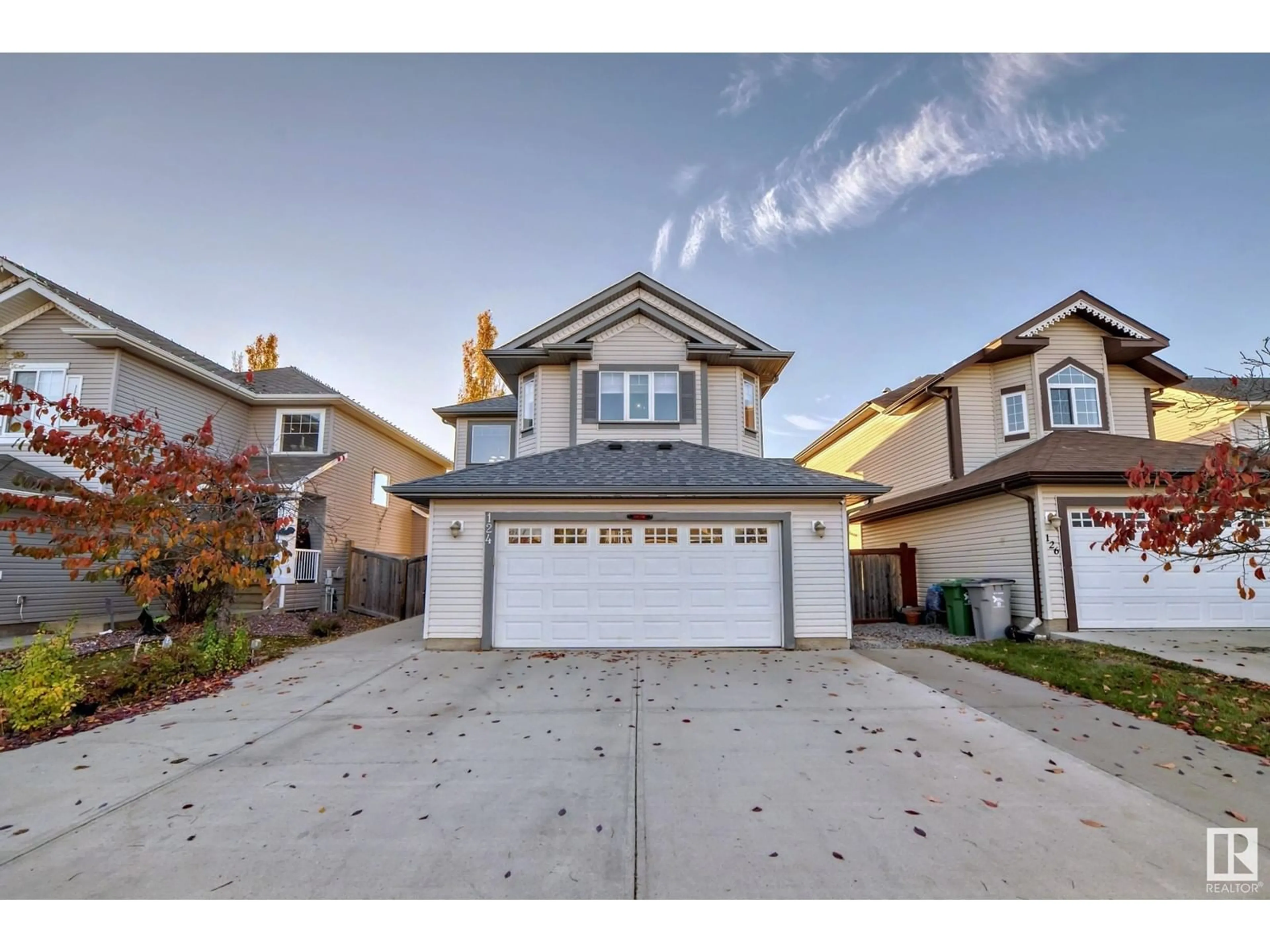 Frontside or backside of a home, the street view for 124 RUE Madelene, Beaumont Alberta T4X0C5