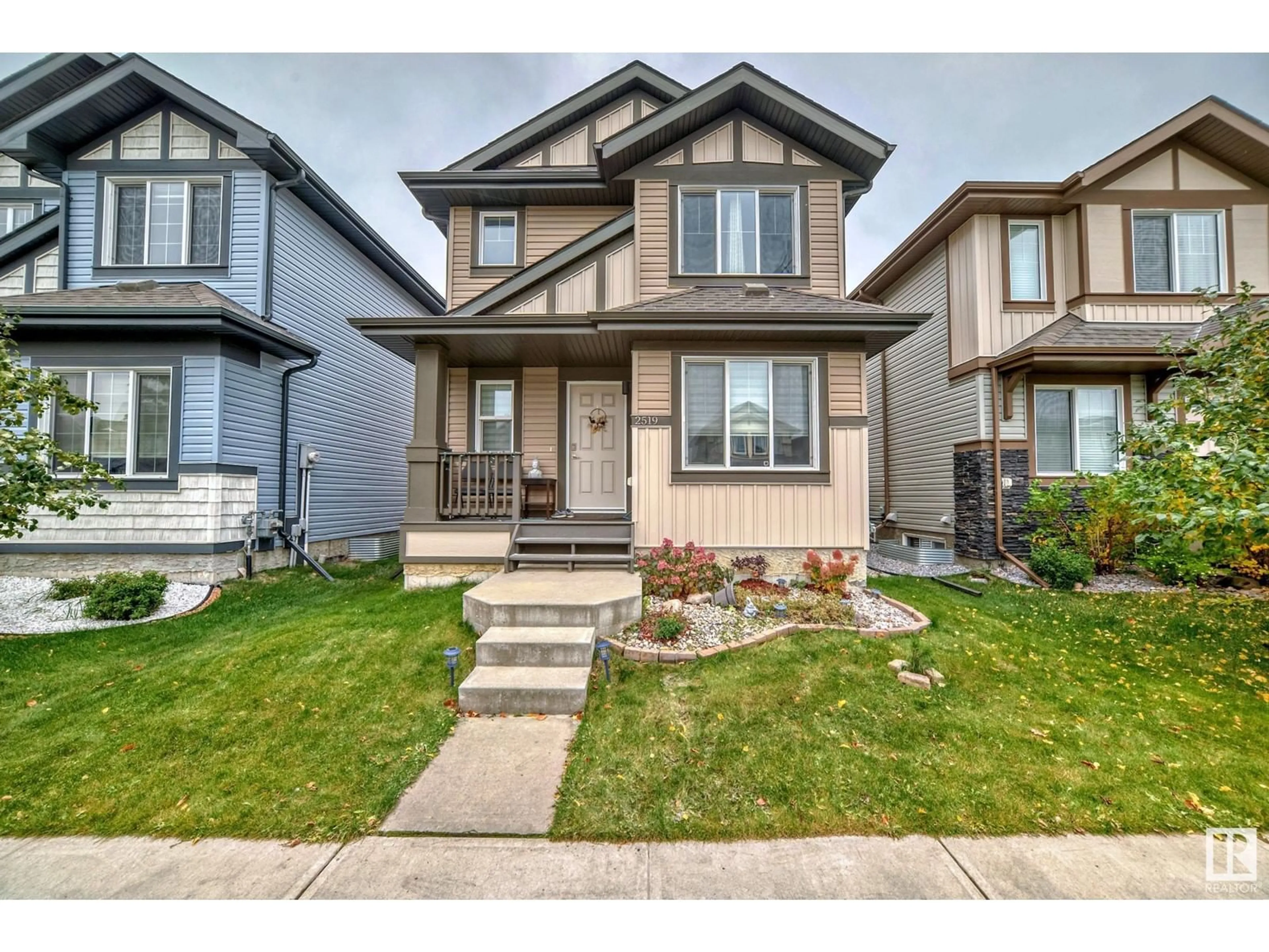 Frontside or backside of a home, the street view for 2519 20 AV NW, Edmonton Alberta T6T0Y7