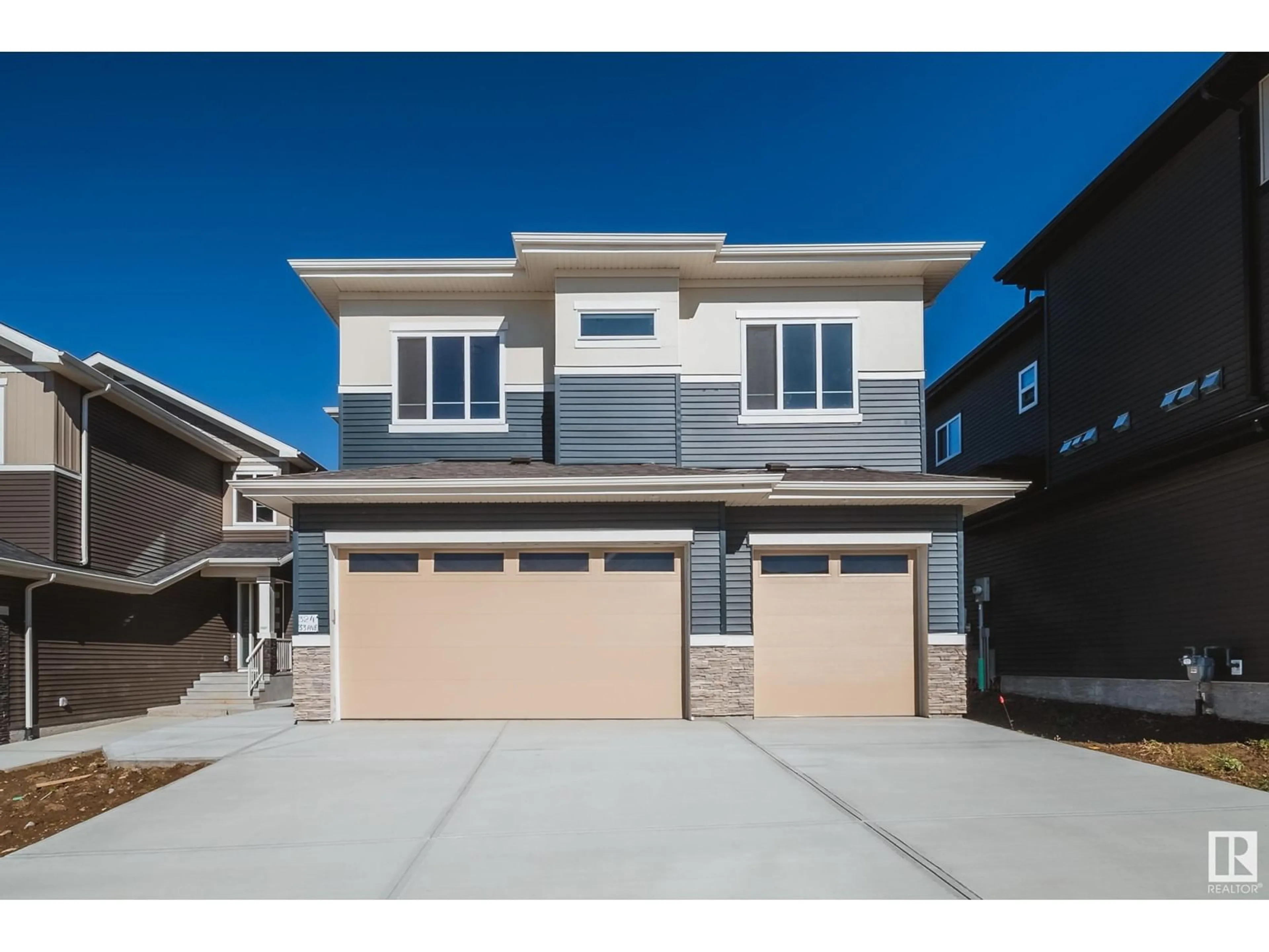 Frontside or backside of a home, the street view for 324 33 AV NW, Edmonton Alberta T6T2S9