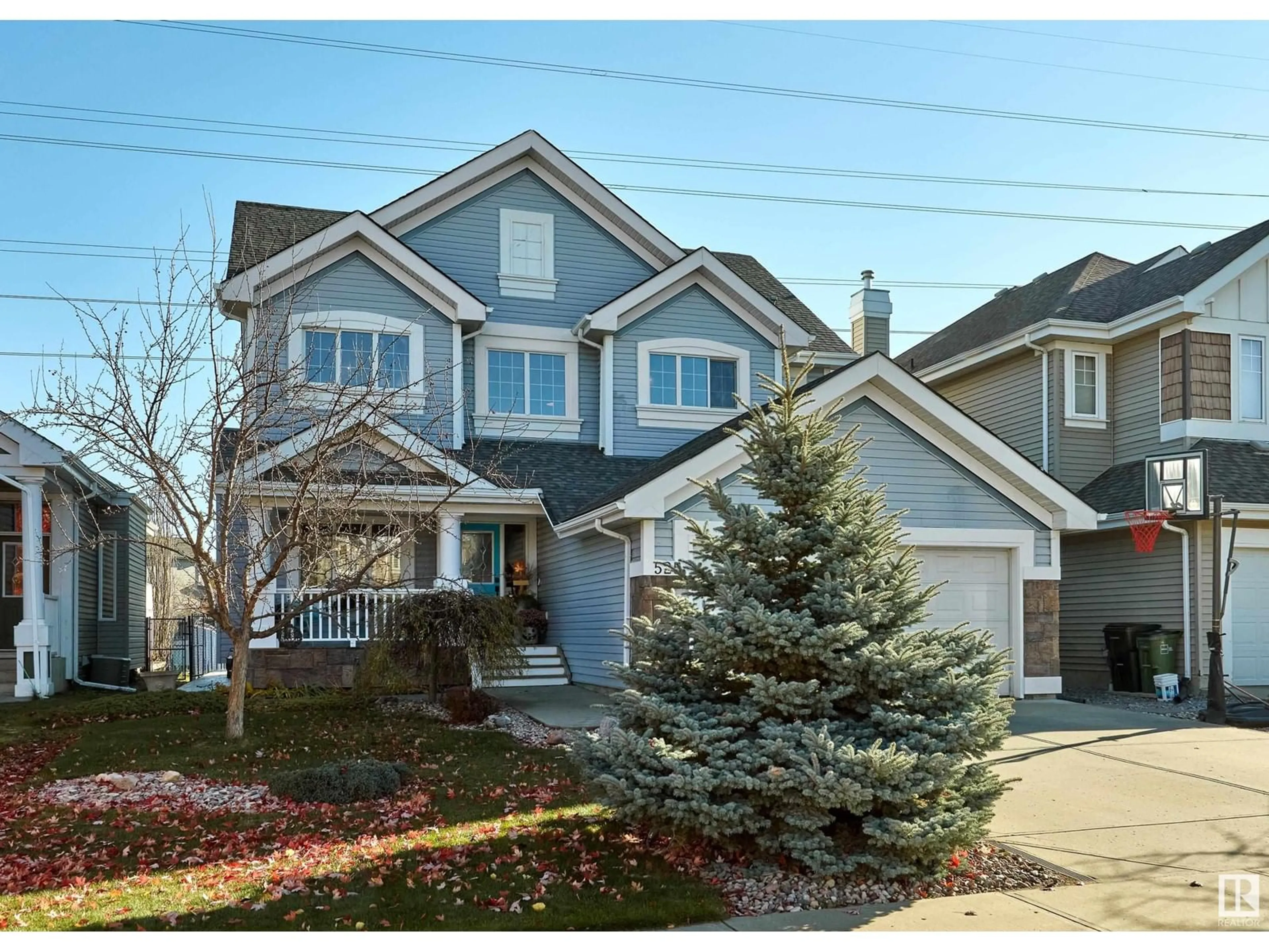 Frontside or backside of a home, the street view for 525 STEWART CR SW, Edmonton Alberta T6X0A8