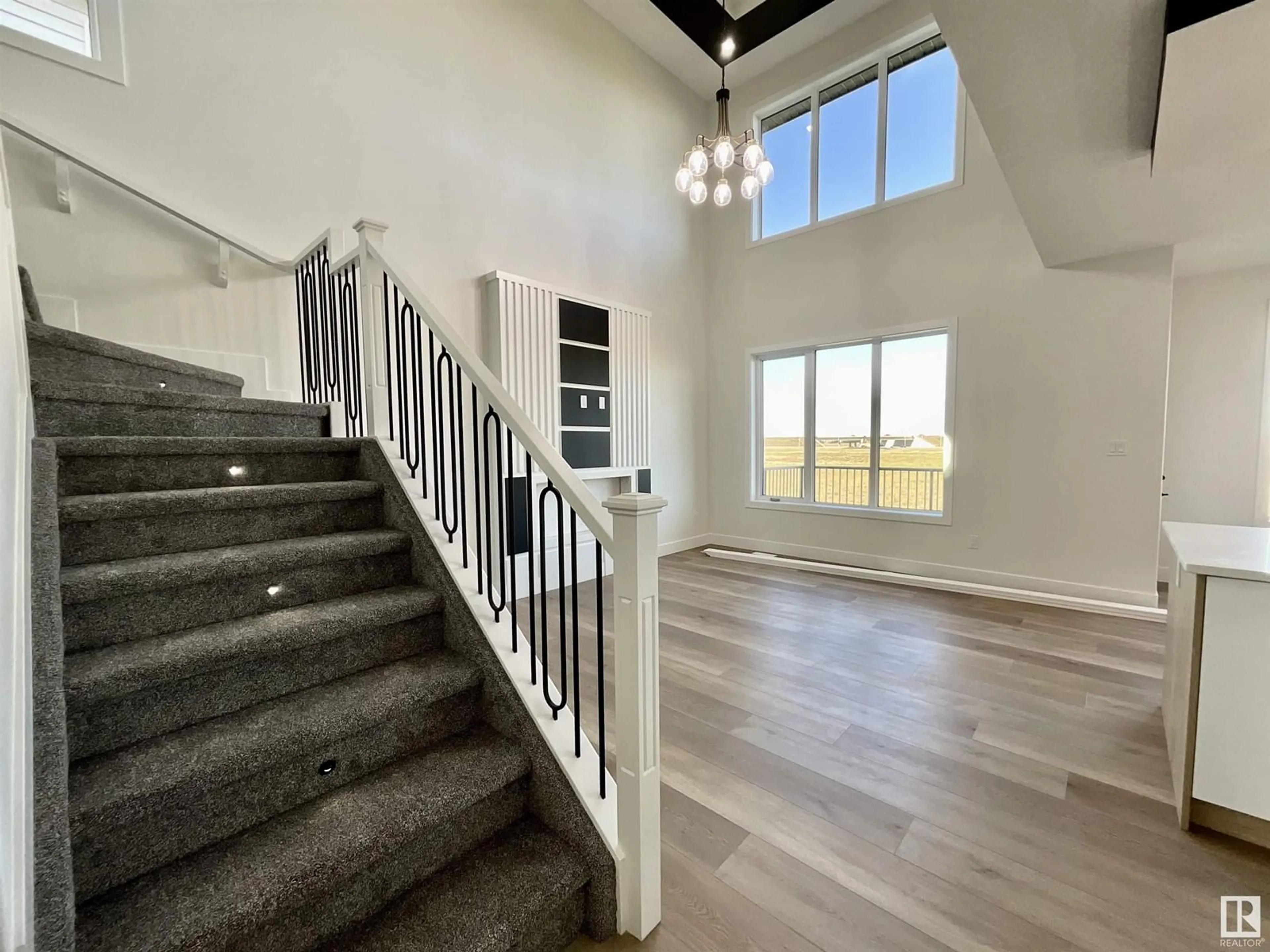 Indoor foyer, wood floors for 18216 94 ST NW, Edmonton Alberta T5Z0V1