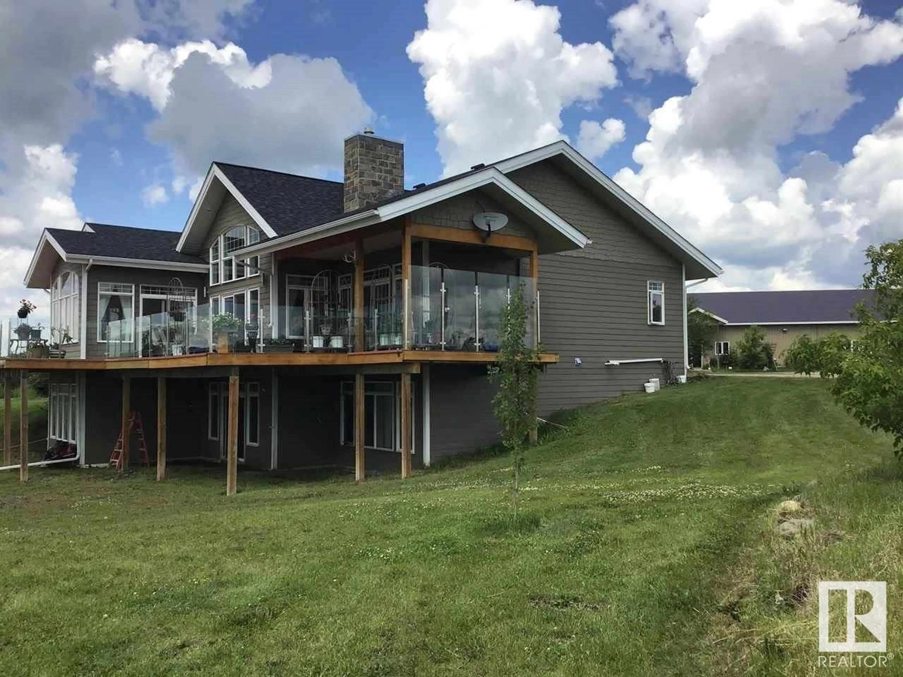 Frontside or backside of a home, the front or back of building for 54028 Range Road 142, Rural Minburn County Alberta T9C1R9