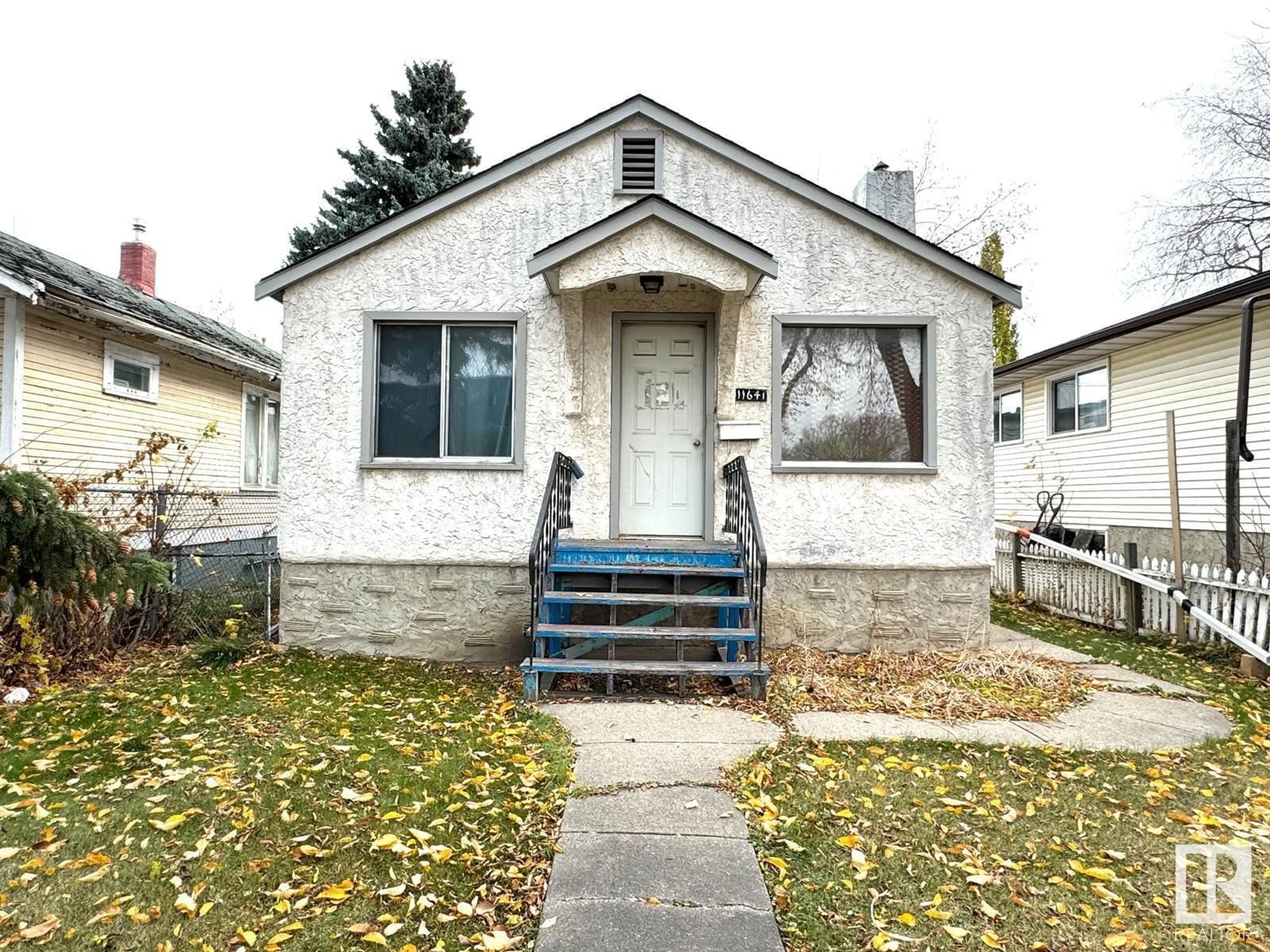 Frontside or backside of a home, cottage for 11641 95A ST NW, Edmonton Alberta T5G1P7