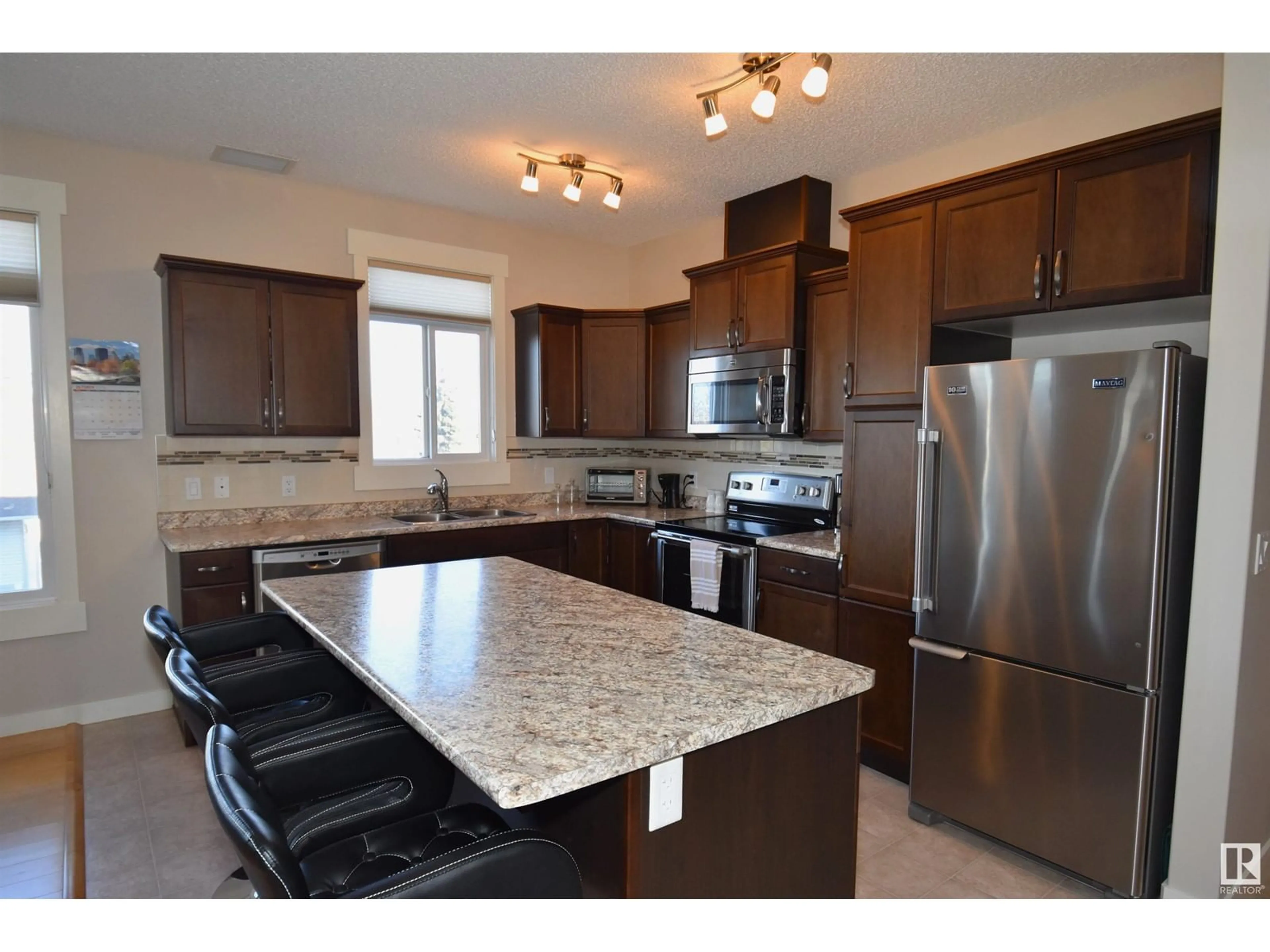 Open concept kitchen for #210 511 QUEEN ST, Spruce Grove Alberta T7X0G4