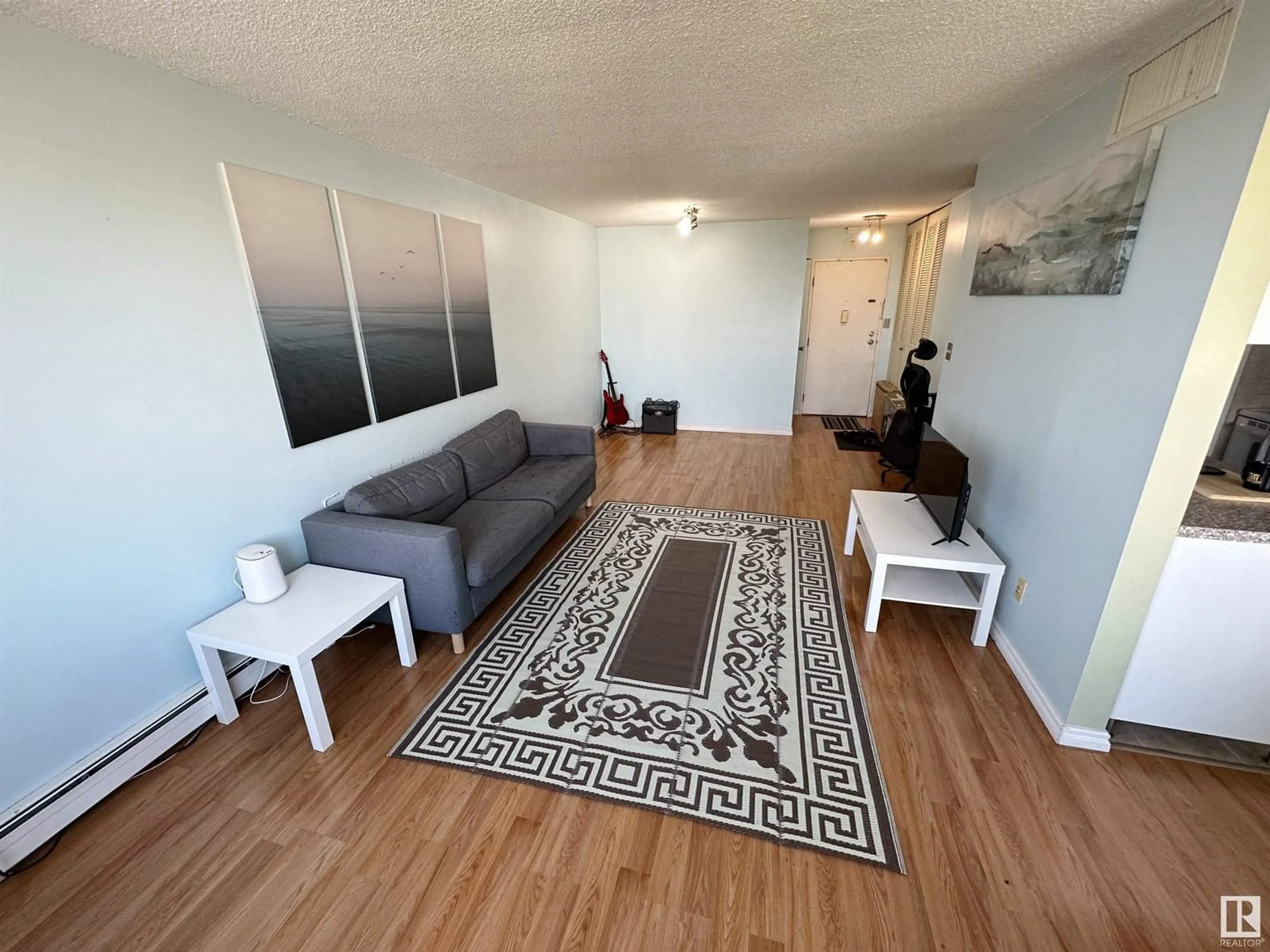 A pic of a room, wood floors for #1405 9909 104 ST NW, Edmonton Alberta T5K2G5