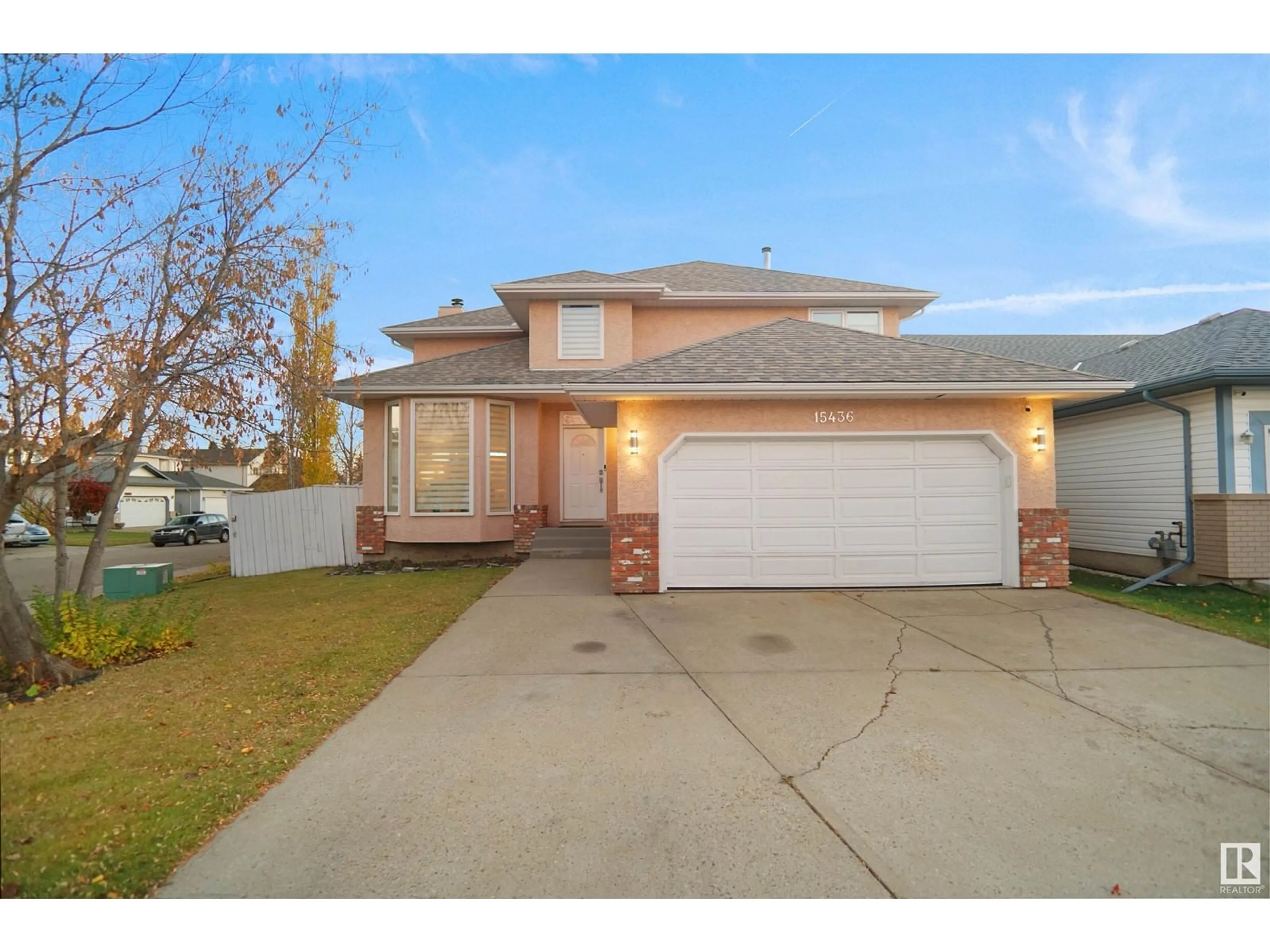 Frontside or backside of a home, the street view for 15436 65 ST NW, Edmonton Alberta T5Y2N7