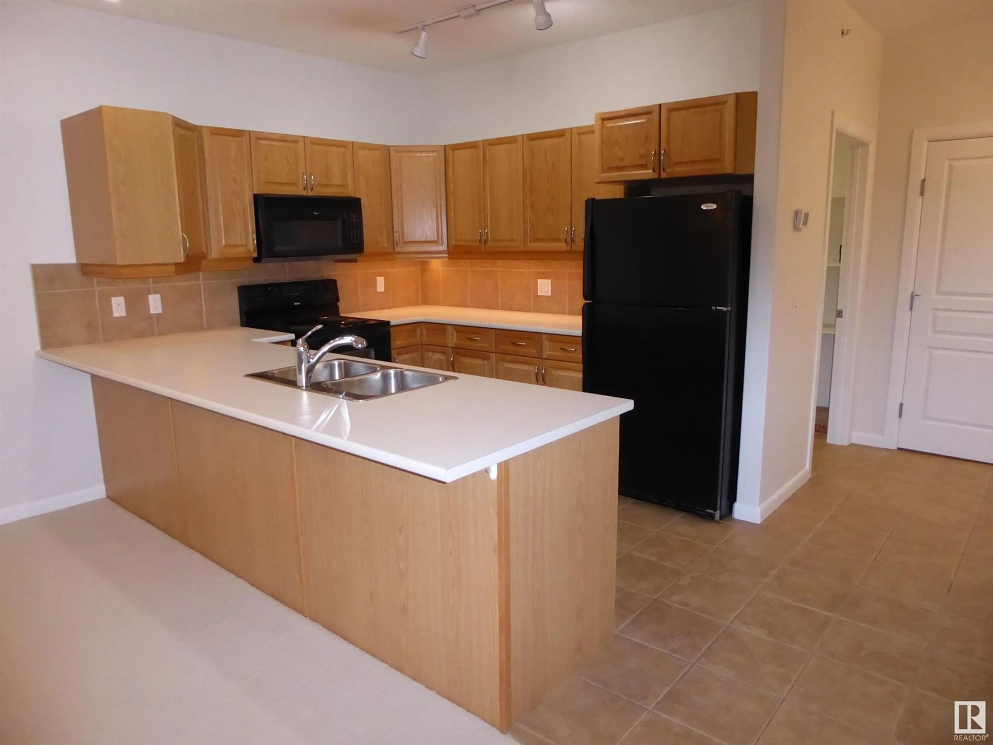 Standard kitchen, not visible floor for #201 160 Magrath RD NW NW, Edmonton Alberta T6R3T7