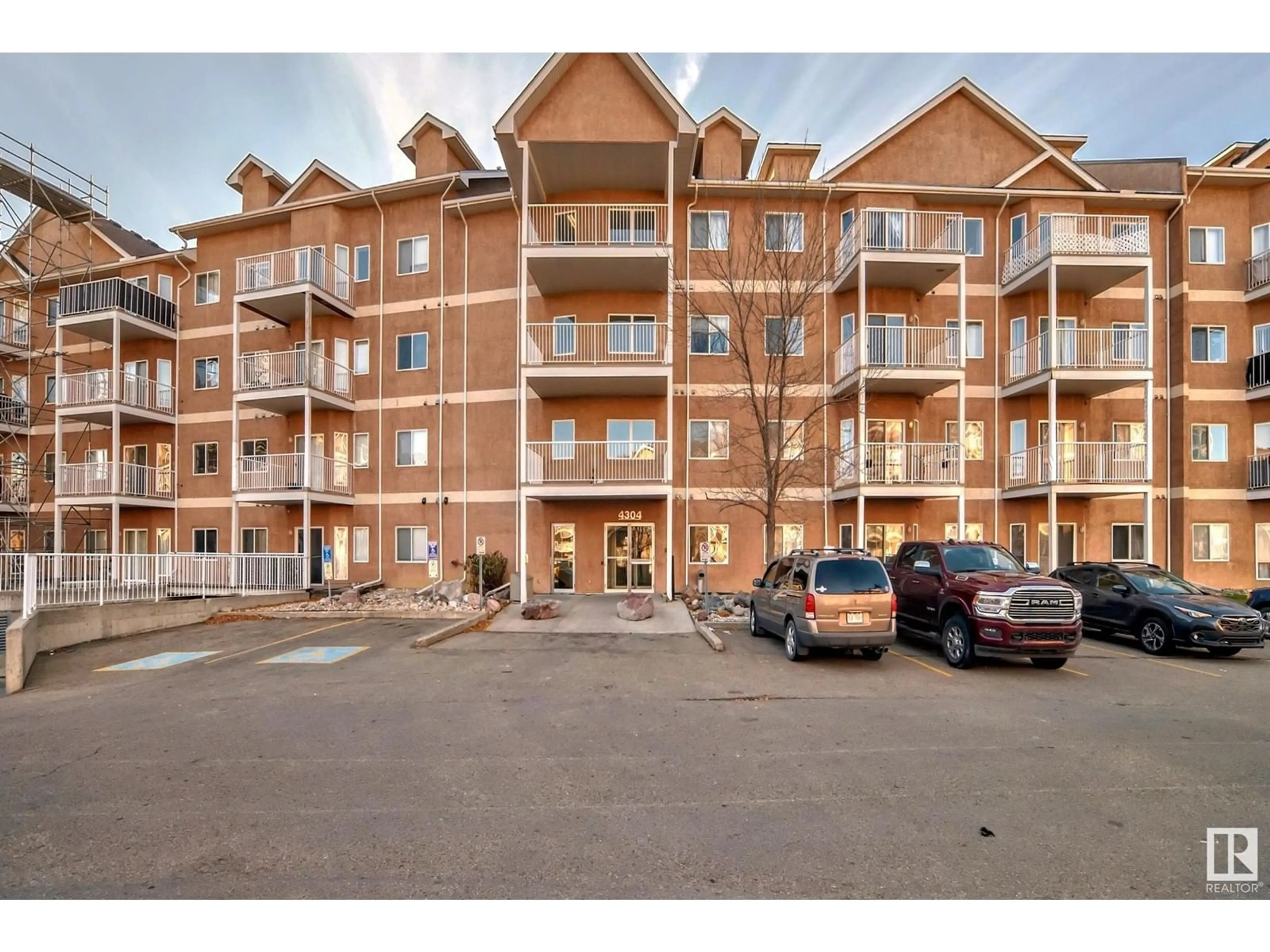 A pic from exterior of the house or condo, the front or back of building for #210 4304 139 AV NW NW, Edmonton Alberta T5Y0H6